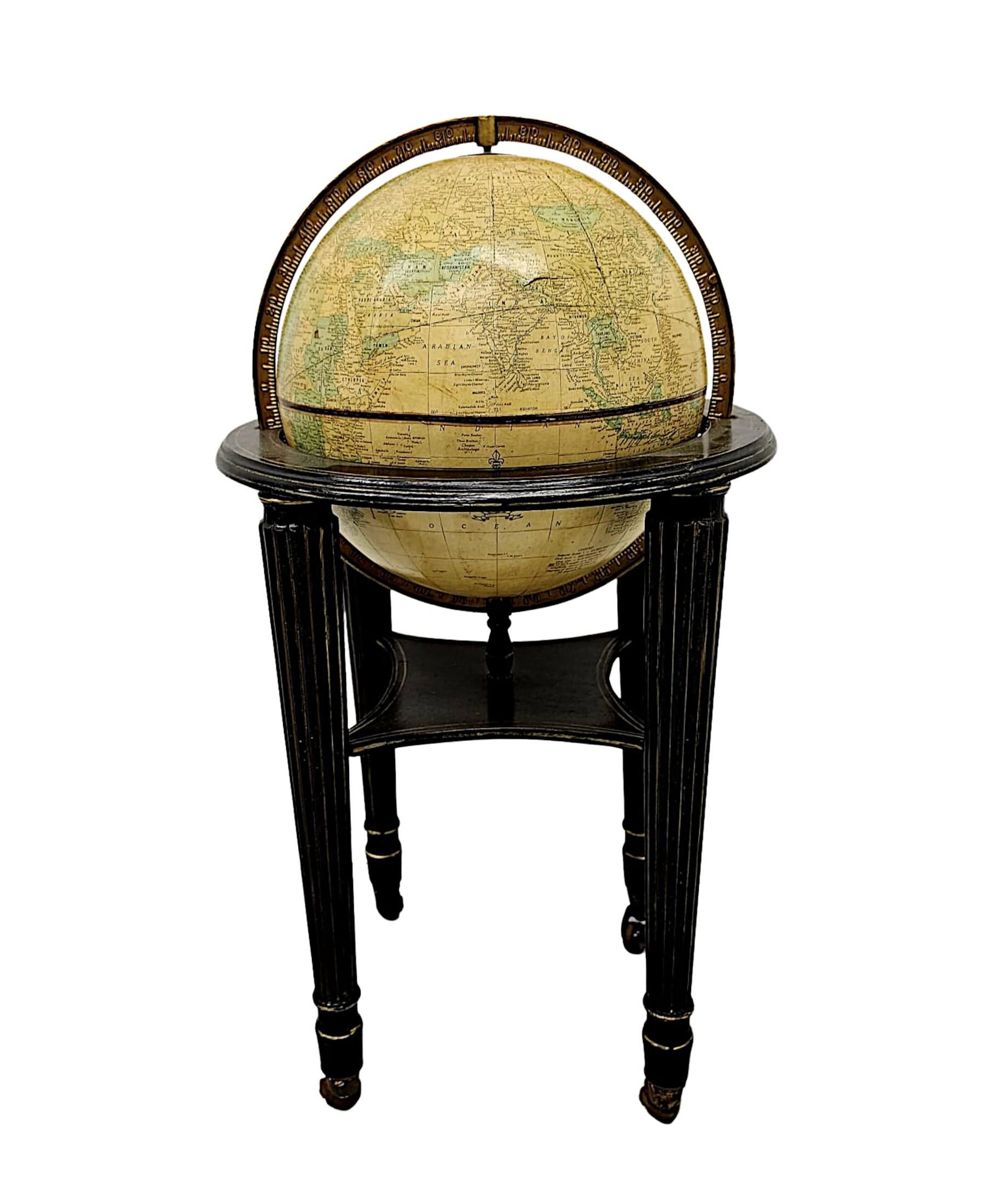 A lovely rare vintage imperial world globe featuring a finely cast brass meridian and beautifully illustrating the territorial map, ocean currents and main trade routes.  The stem holds a swivel globe which is signed Cram Universal, made by George