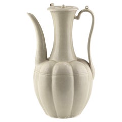 A Rare Cream-Glazed Ding yao Ewer and Cover, Five Dynasties/Song Dynasty