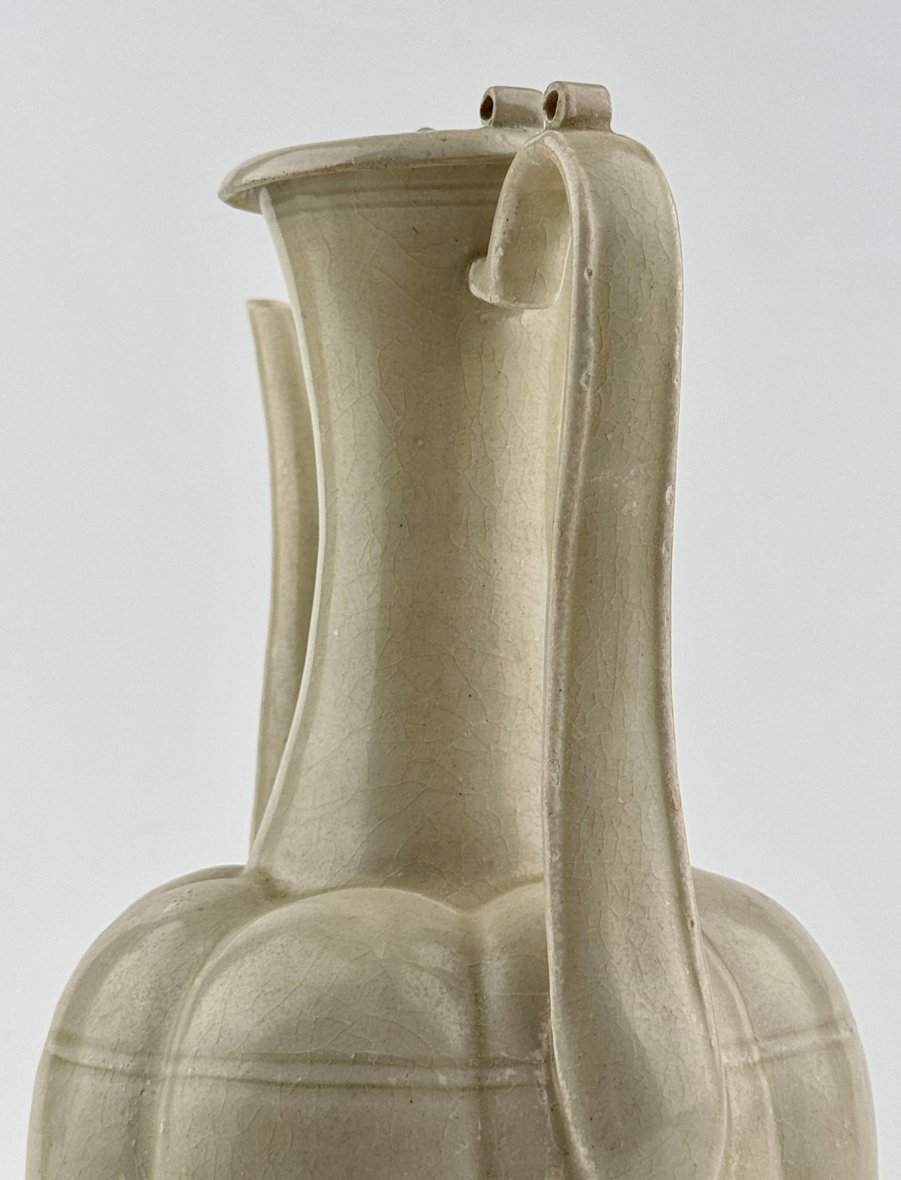 A Rare Cream-Glazed Ding yao Ewer and Cover, Northern Song Dynasty (960–1127) For Sale 12