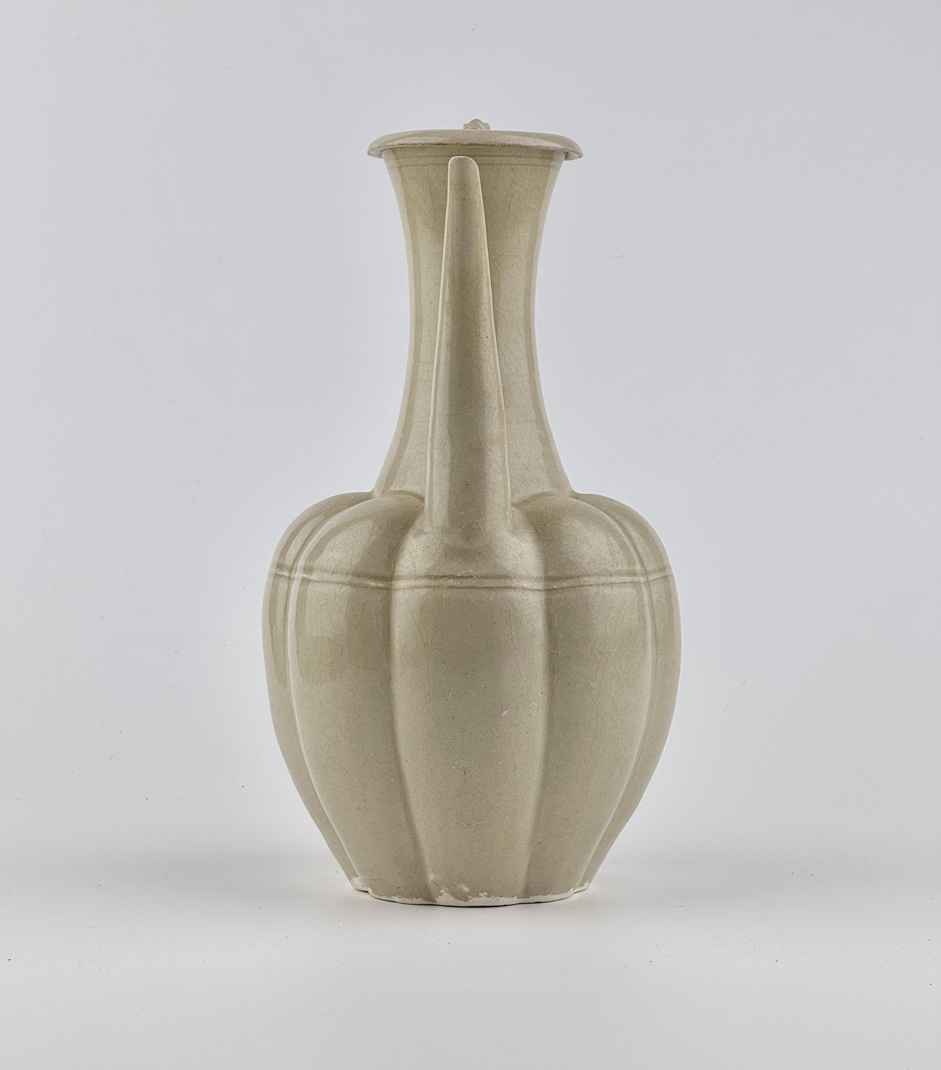 Hong Kong A Rare Cream-Glazed Ding yao Ewer and Cover, Northern Song Dynasty (960–1127) For Sale