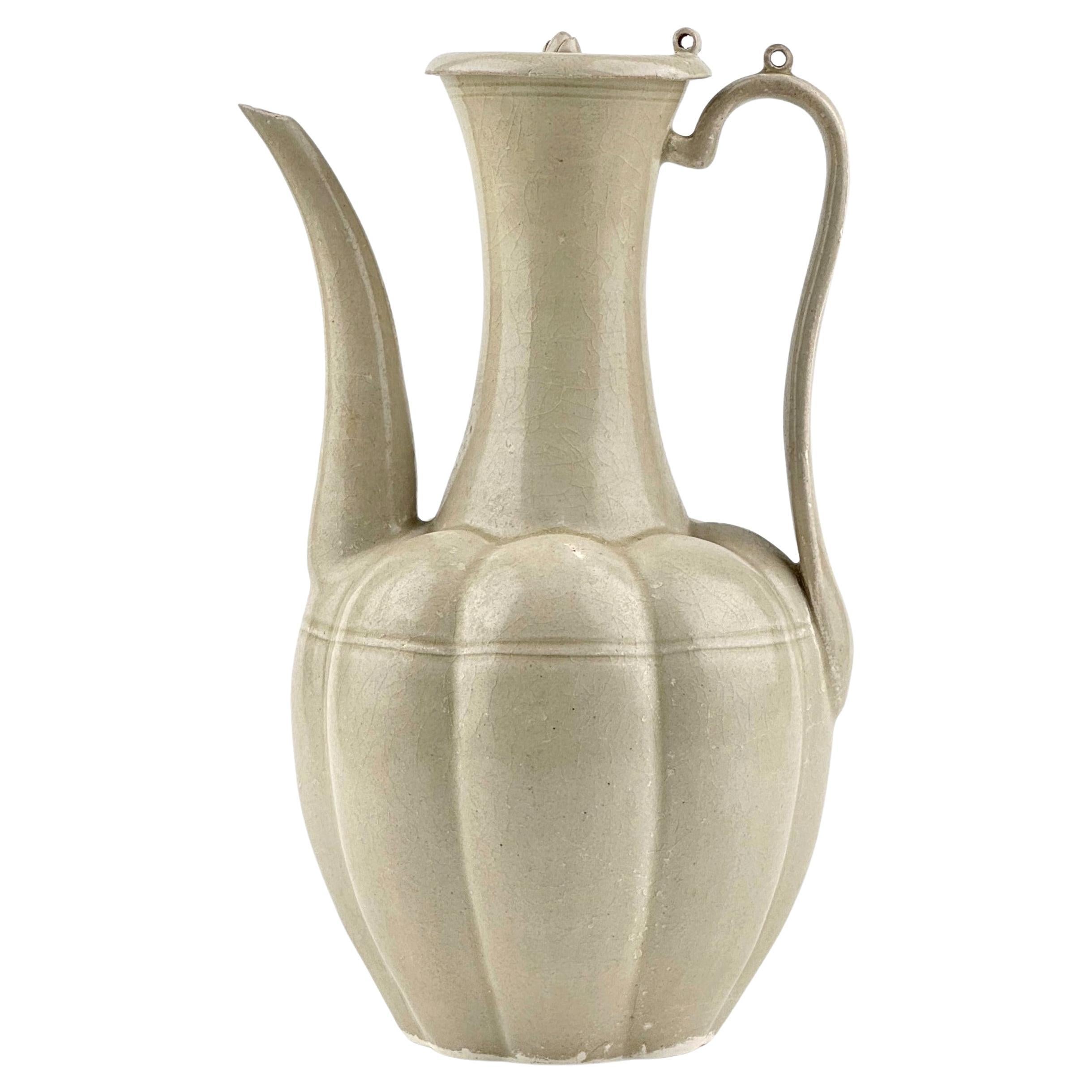 A Rare Cream-Glazed Ding yao Ewer and Cover, Northern Song Dynasty (960–1127)