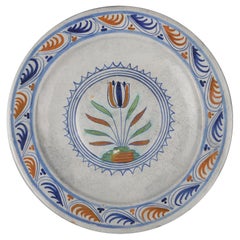 Rare Dutch Majolica Dish with Tulip, Early 17th Century