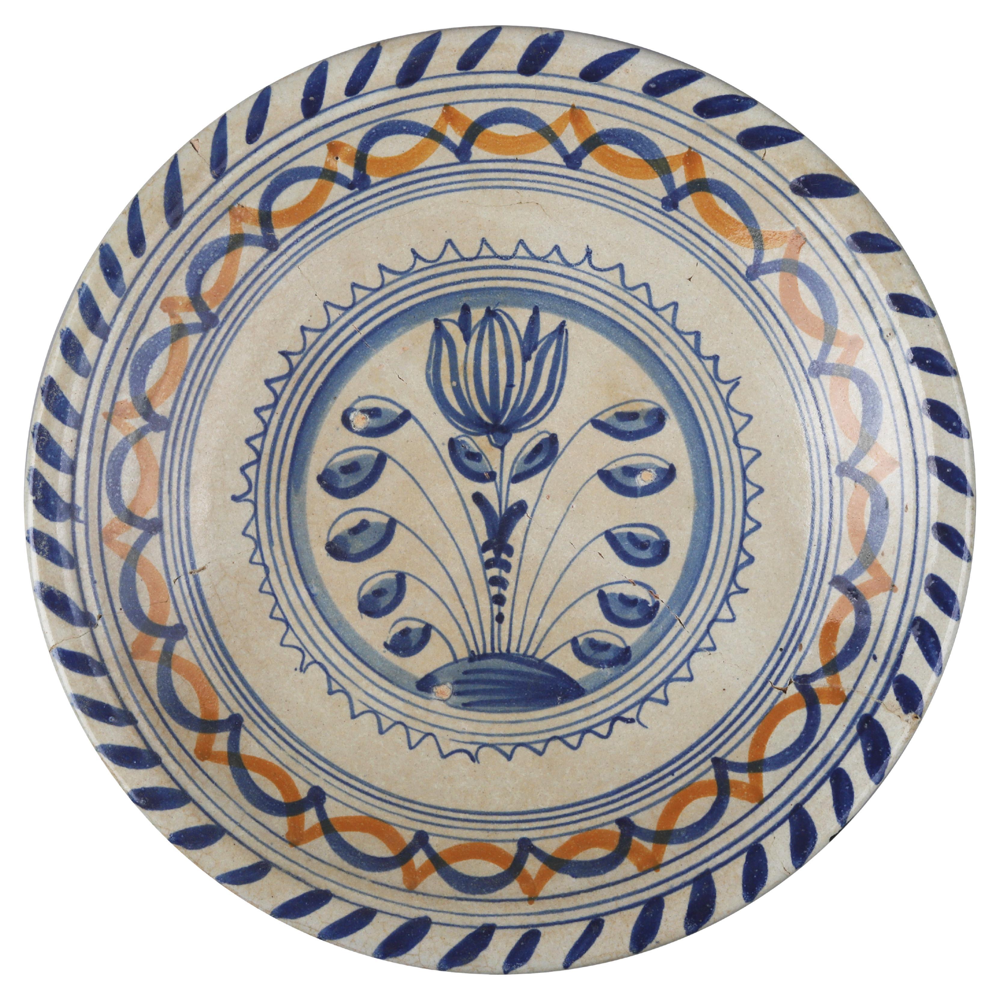 Rare Dutch Majolica Plate with Tulip, Early 17th Century For Sale
