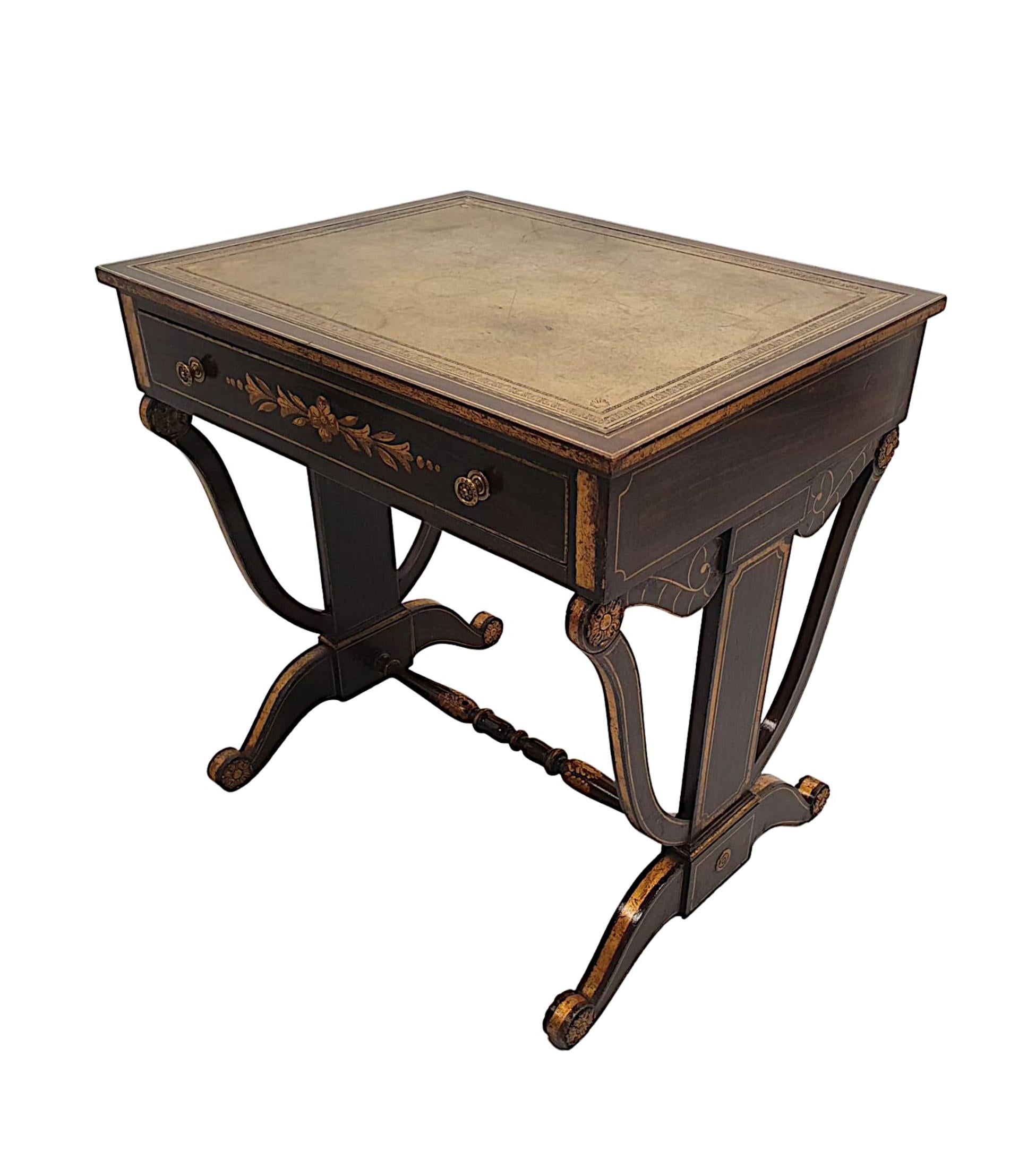 A very fine and rare early 19th century American Baltimore Federal painted writing table with fabulous parcel gilt detail throughout. The moulded top of rectangular form is fitted with a gorgeous green embossed tooled leather writing skiver surface