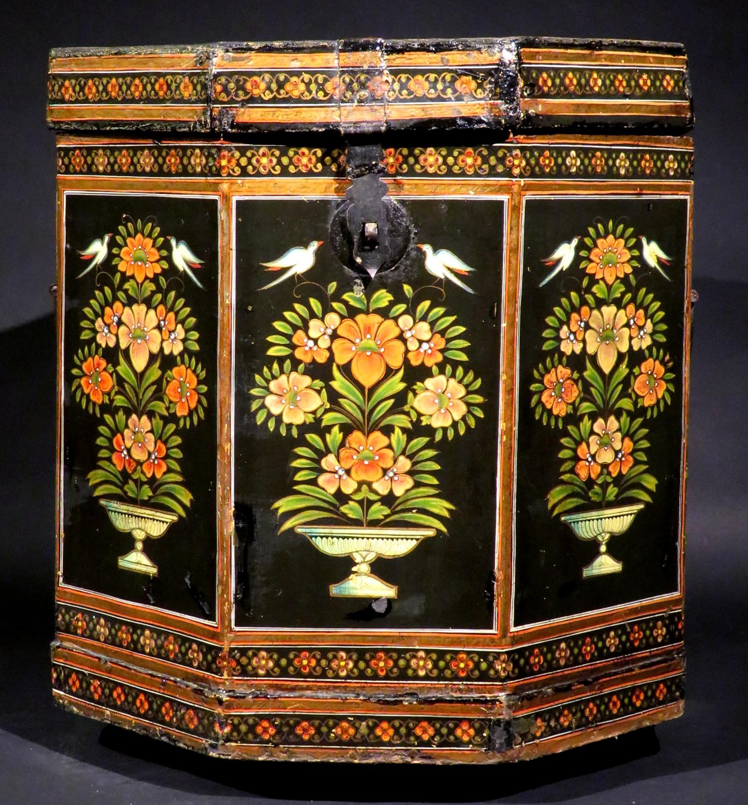 A highly decorative & rare 19th century Anglo Indian papier mache campaign cellarette, likely made in Kashmir for a British military officer posted in India during the days of the Raj.  
The octagonal shaped, black lacquered papier mache case
