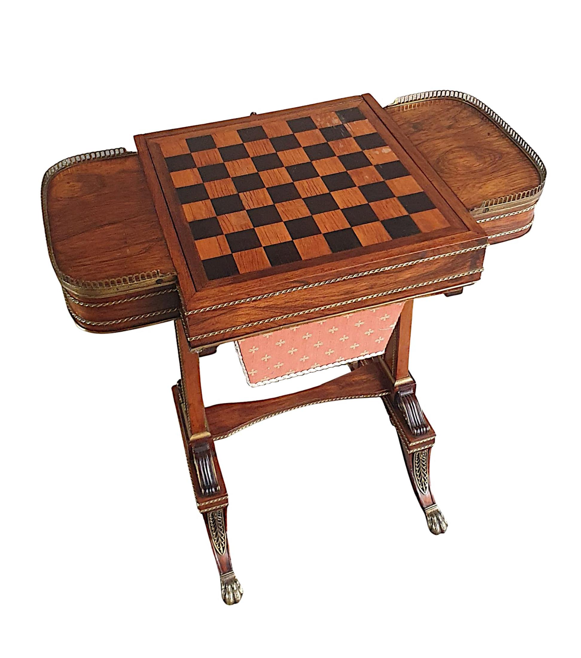 A rare, stunning quality early 19th Century Regency fruitwood combination games or work table, inlaid and brass mounted throughout. The moulded central section with inlaid checkerboard flanked with demilune sides with pierced brass gallery grille.