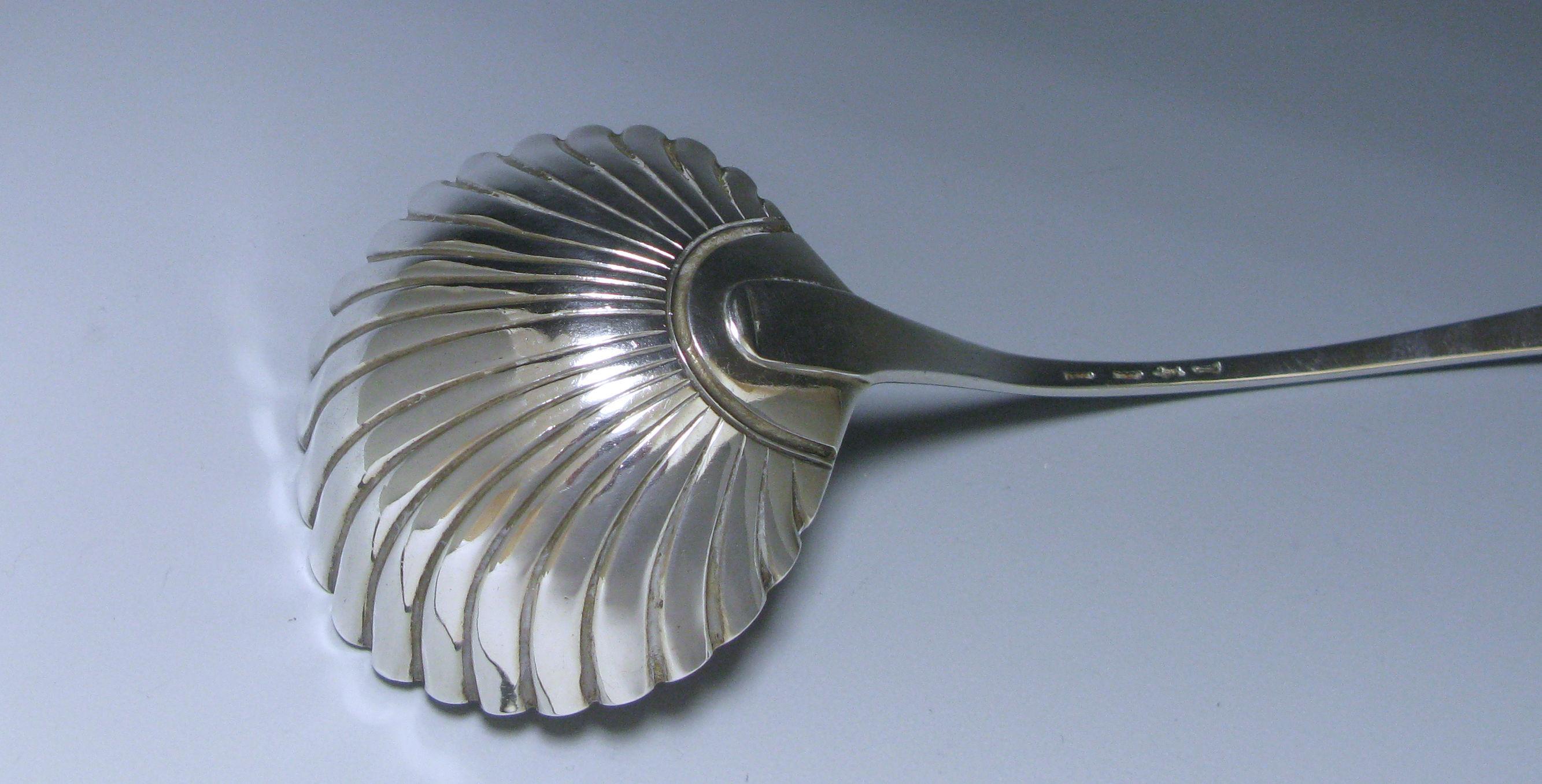 A rare early George II antique silver Rococo soup ladle with a shell bowl ladle. The reverse side of the ladle is plain.

Length 12.95 inches 32.9 cm

Maker James Tookey
Origin London
Year 1754.
  