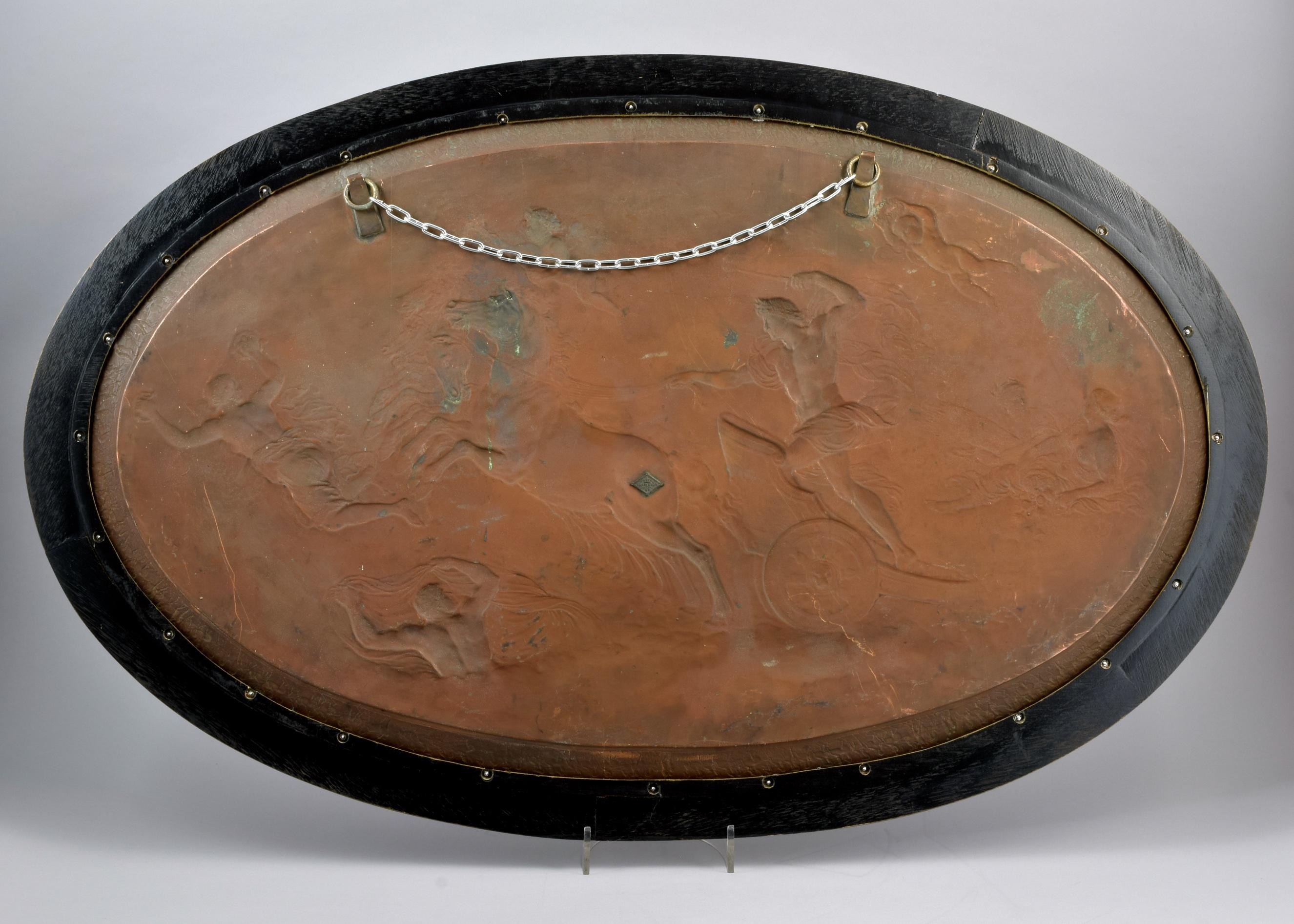 Likely depicting Hercules on a four horse drawn chariot. The boarder embellished with further classical scenes of horses and classical figures. In a wooden frame. Very good condition. 

Bibliography:

Elkington & Co, founded in Birmingham 1815, is