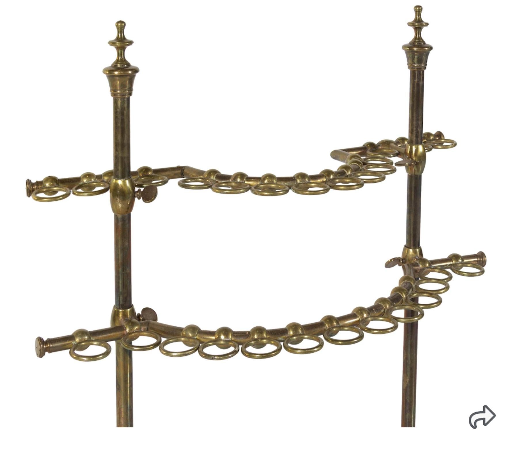 A rare English brass cane/pool cue stand
19th century shown with the colletion of canes, not included.
Measures: Height 41 1/2 x width 22 inches.
Property from an important private collection.