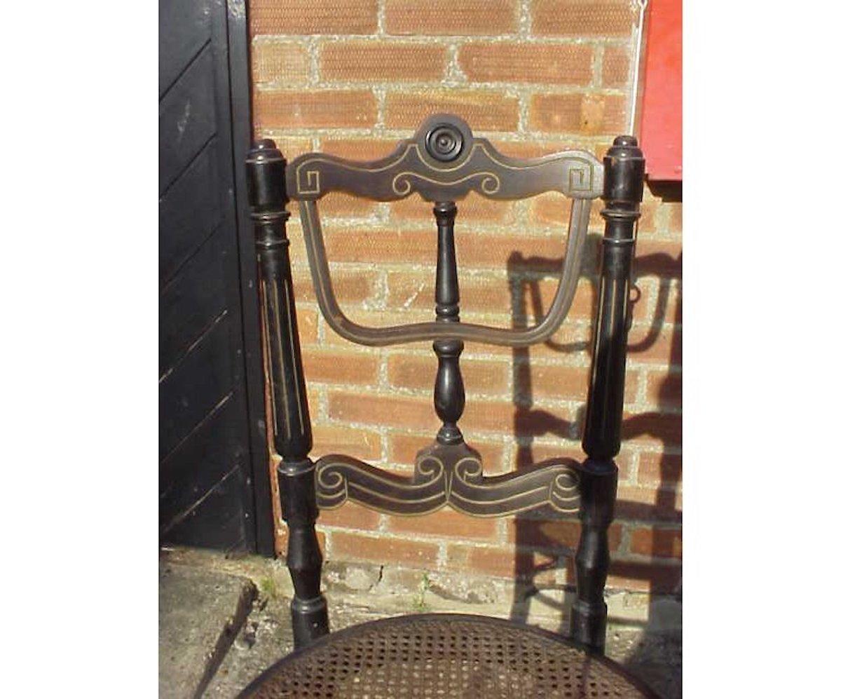 A rare Fischel bentwood ebonized side chair incised gilded decoration and original cane seat.
Original Fischel paper label to the underneath of the seat.