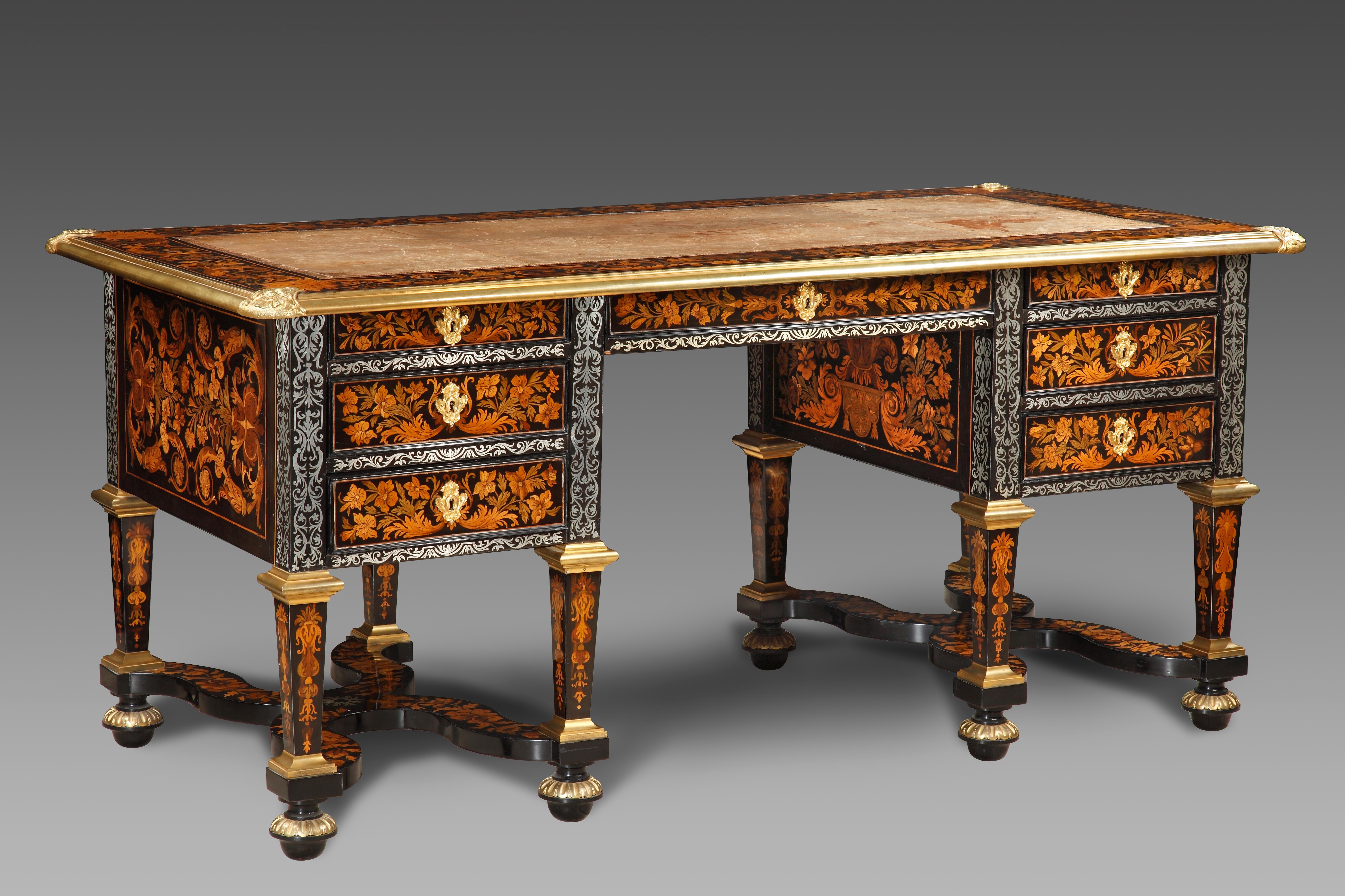 A rare French Louis XIV large pewter and fruitwood inlaid marquetry  desk called “bureau Mazarin” attributed to Pierre Gole (1620 – 1684)
Dimensions : h. 32.68 in, w. 70.8 in, d. 35.43 in.
Late 17th century 
This unusually large rectangular desk is