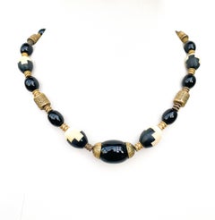 A rare Galaltith, glass and gilt metal necklace, Louis Rousselet, France, 1920s.