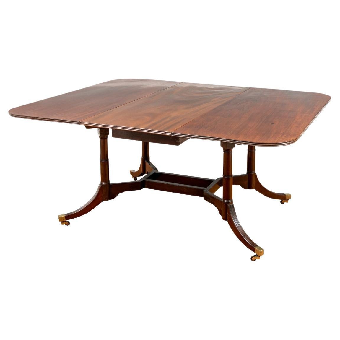 A Rare George III Cumberland Action Mahogany Drop-Leaf Dining Table c. 1800-1820