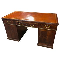 A Rare George III Mahogany Partners Desk