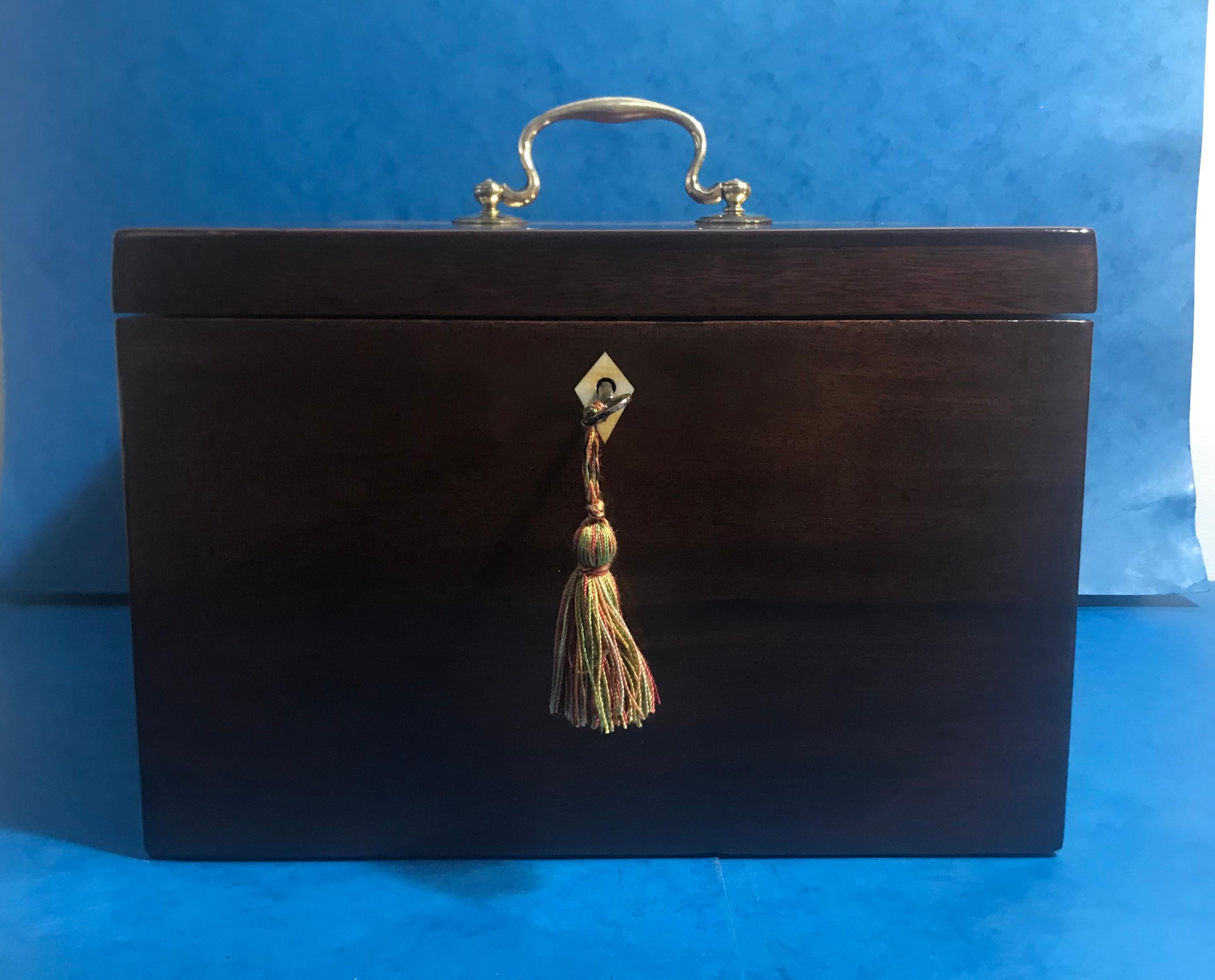 A rare Georgian mahogany jewellery box.
The large jewellery box is solid mahogany, it comes with two side drawers that work of a pin you pull up to release and lock the drawers and original handles making it a rare box with plenty of storage space,