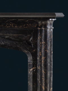 A Rare Gothic Revival Chimneypiece in Portoro & Belgium Black Marbles
