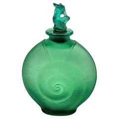 a rare green René Lalique glass perfume bottle "Amphitrite" from ca. 1920