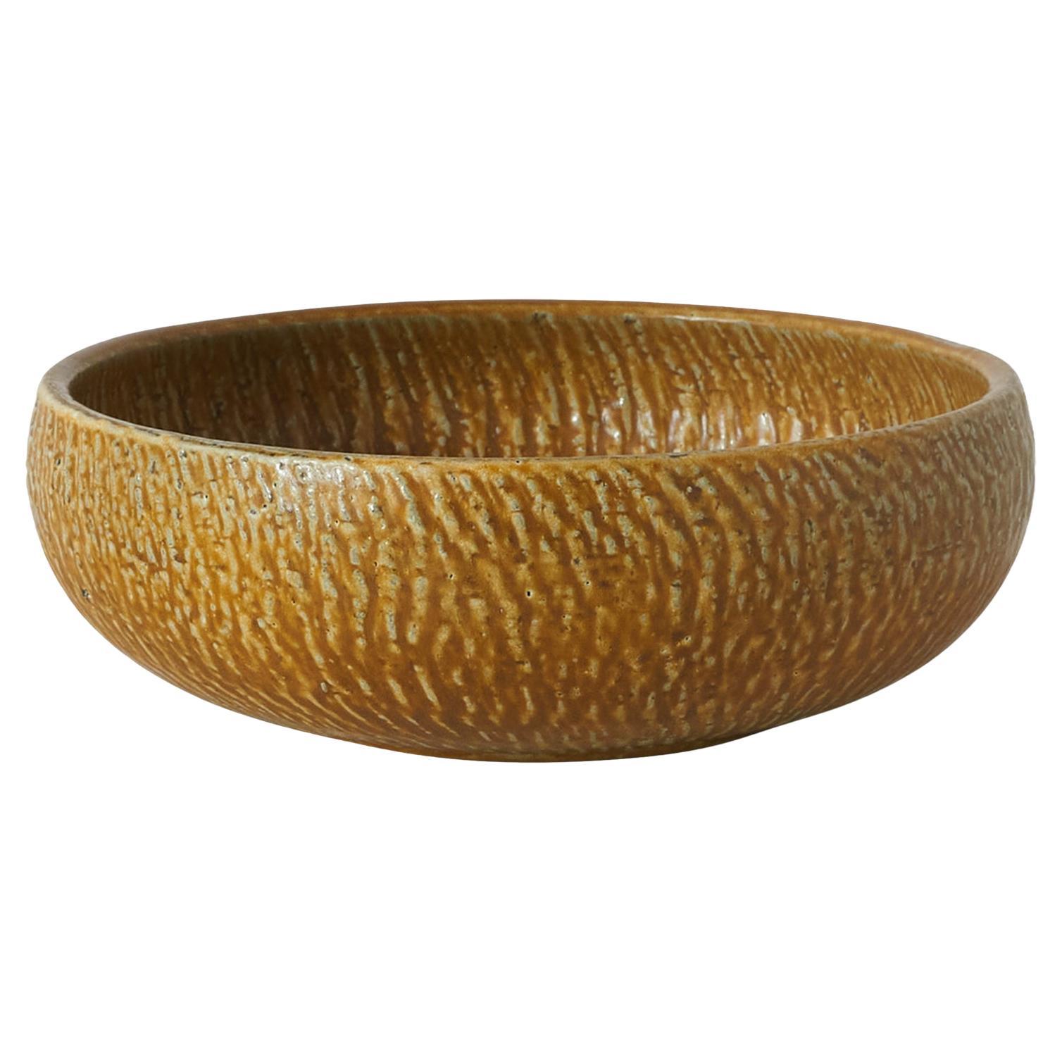 A rare large yellow stoneware bowl by Gunnar Nylund For Sale