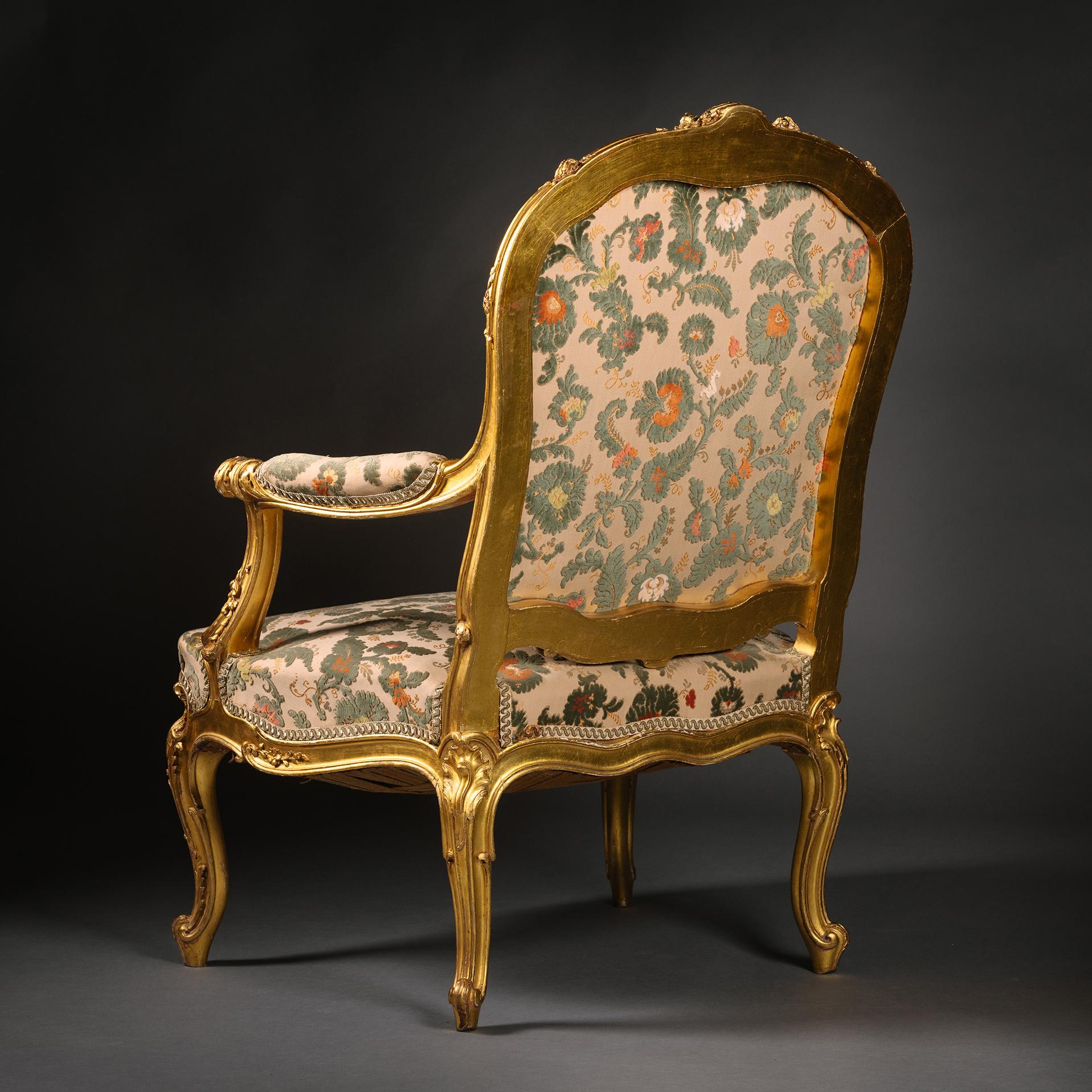 A Rare Louis XV Style Giltwood Fauteuil By François Linke, Paris.

The scroll and channelled frame beautifully carved with rocaille shells and trailing flowers. Reupholstered in acanthus pattern raised velvet. 

Stamped above the back leg