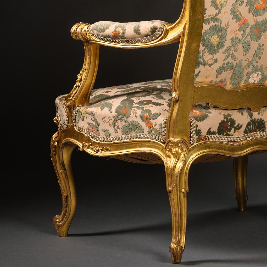 Carved Rare Louis XV Style Giltwood Fauteuil by François Linke For Sale