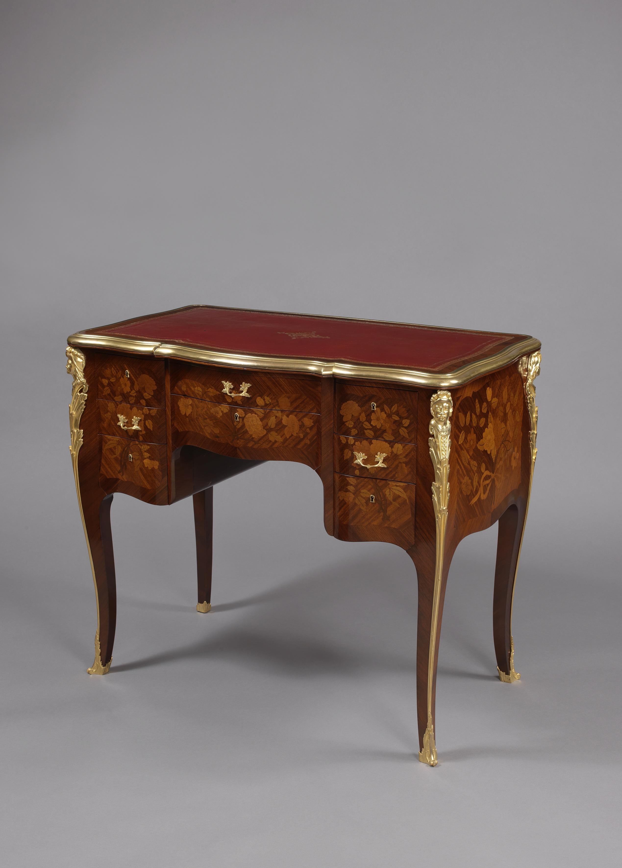 A rare and unusual Louis XV style gilt-bronze mounted and marquetry inlaid Bureau de Dame by François Linke.

French, circa 1890.

Signed to the gilt-bronze rim ‘Linke’. 
Stamped to the reverse of the handles 'FL'. 
The lockplate stamped 'CT
