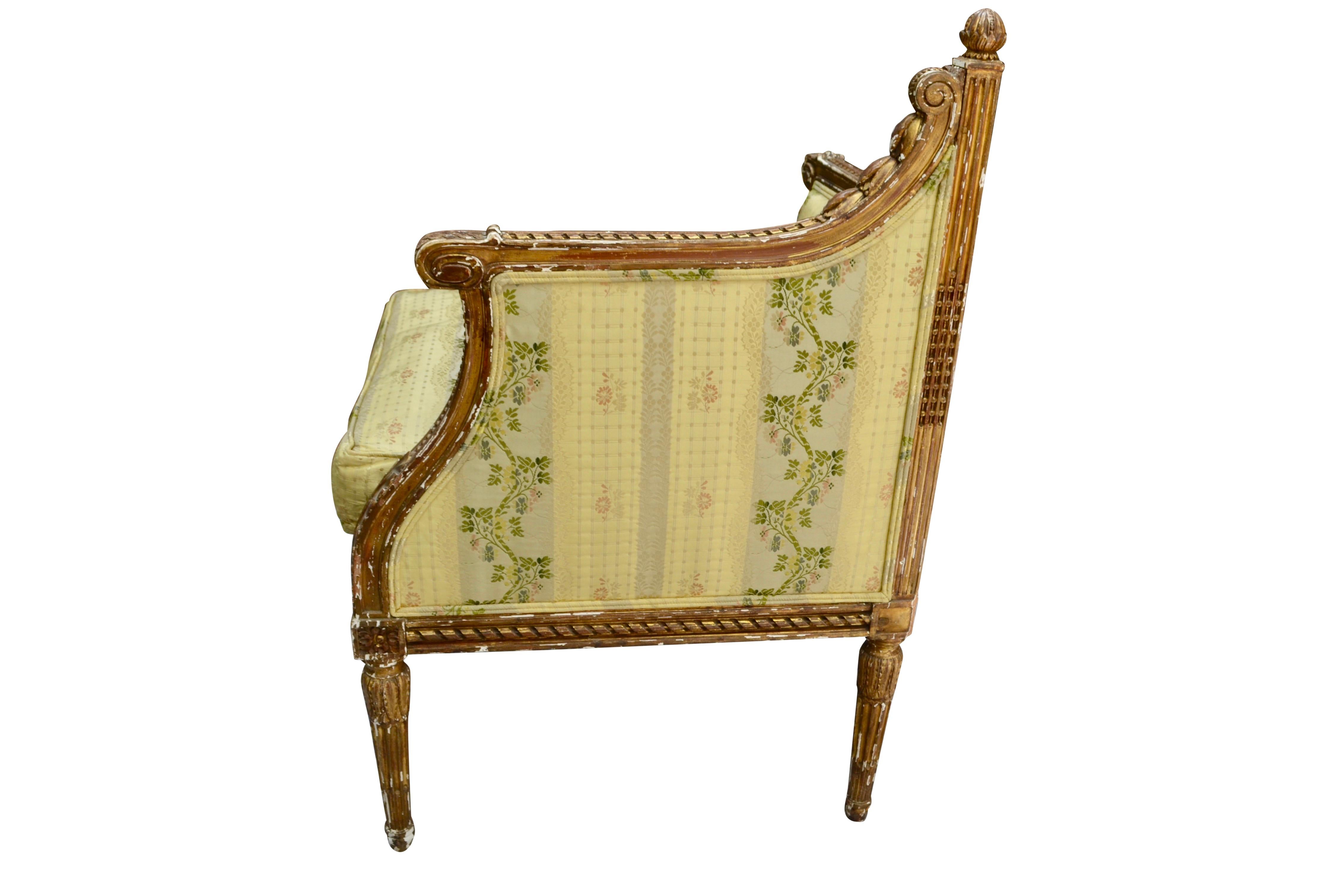 Hand-Carved A Rare Louis XVI Giltwood Corner Chair For Sale