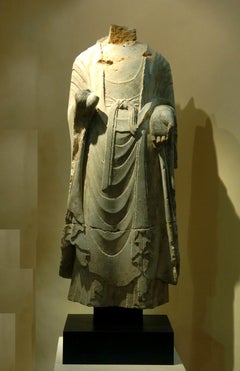 A Rare Massive Standing Limestone Buddha Torso