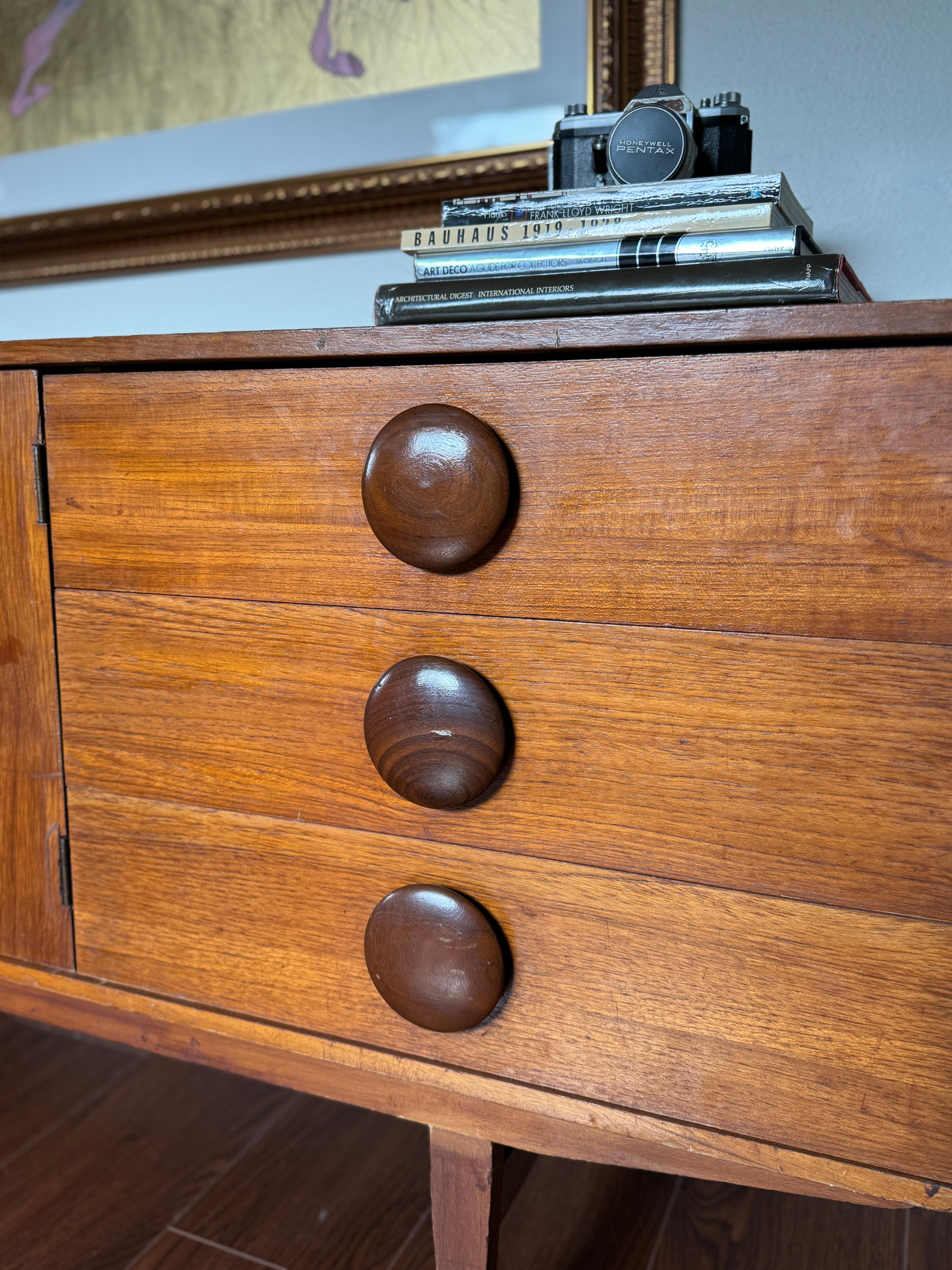Unknown A rare mid century modern sideboard with round wooden pulls, circa 1960s For Sale