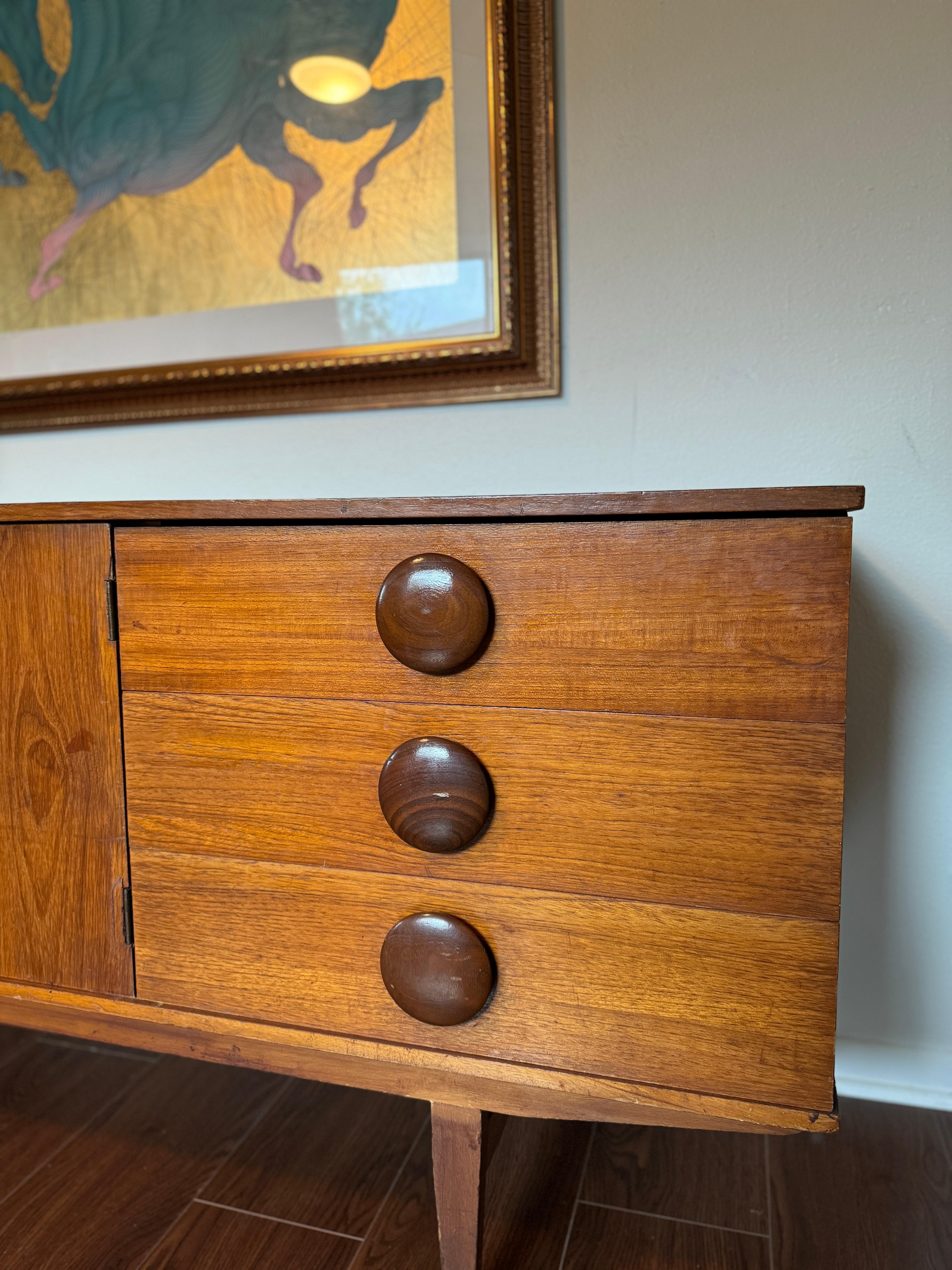 A rare mid century modern sideboard with round wooden pulls, circa 1960s For Sale 1