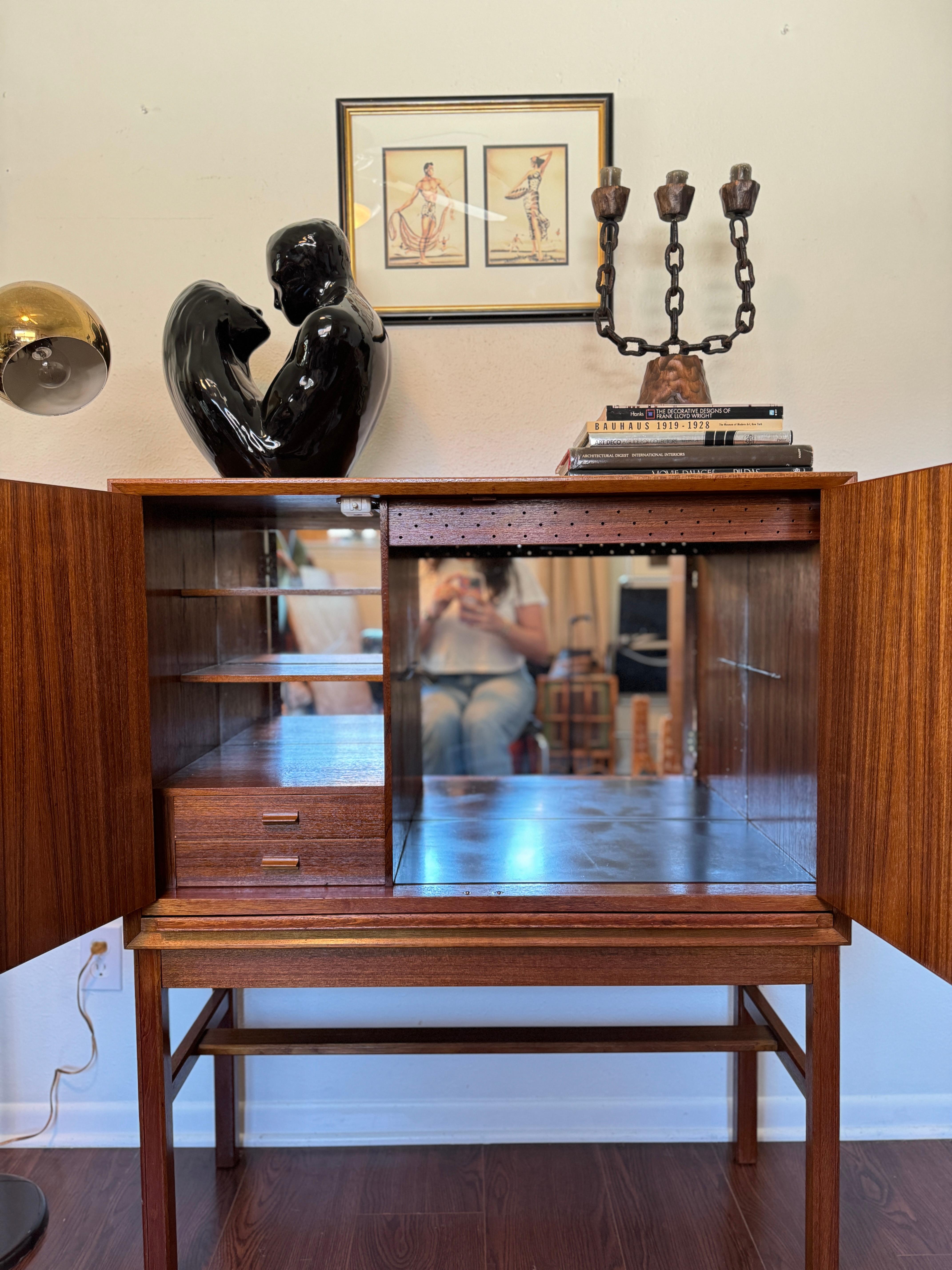 A rare mid century modern tall bar cabinet with a pull out surface For Sale 4