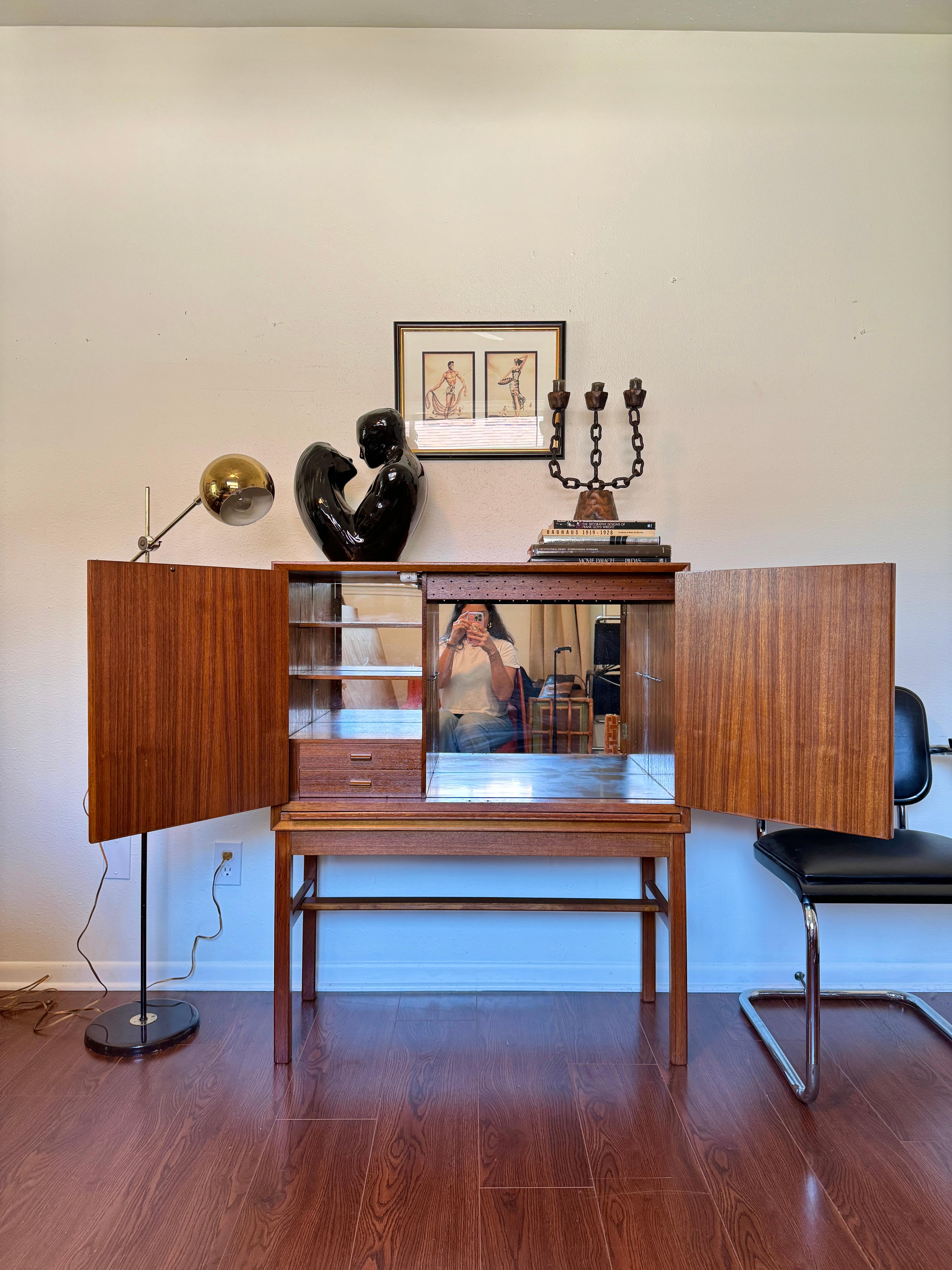 A rare mid century modern tall bar cabinet with a pull out surface 6