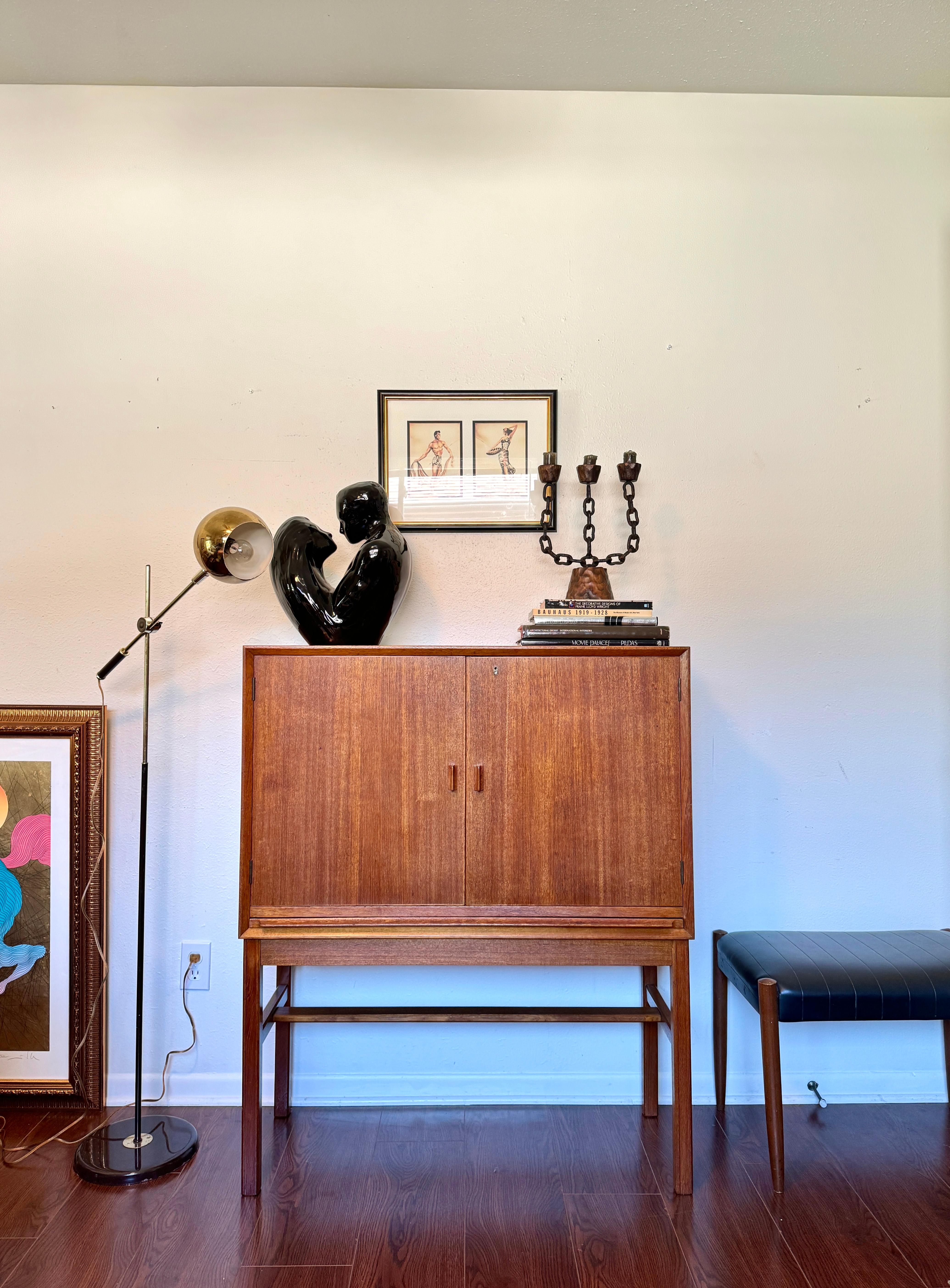 European A rare mid century modern tall bar cabinet with a pull out surface