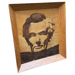 A rare mid-century portrait of Abraham Lincoln executed in inlaid woods signed K