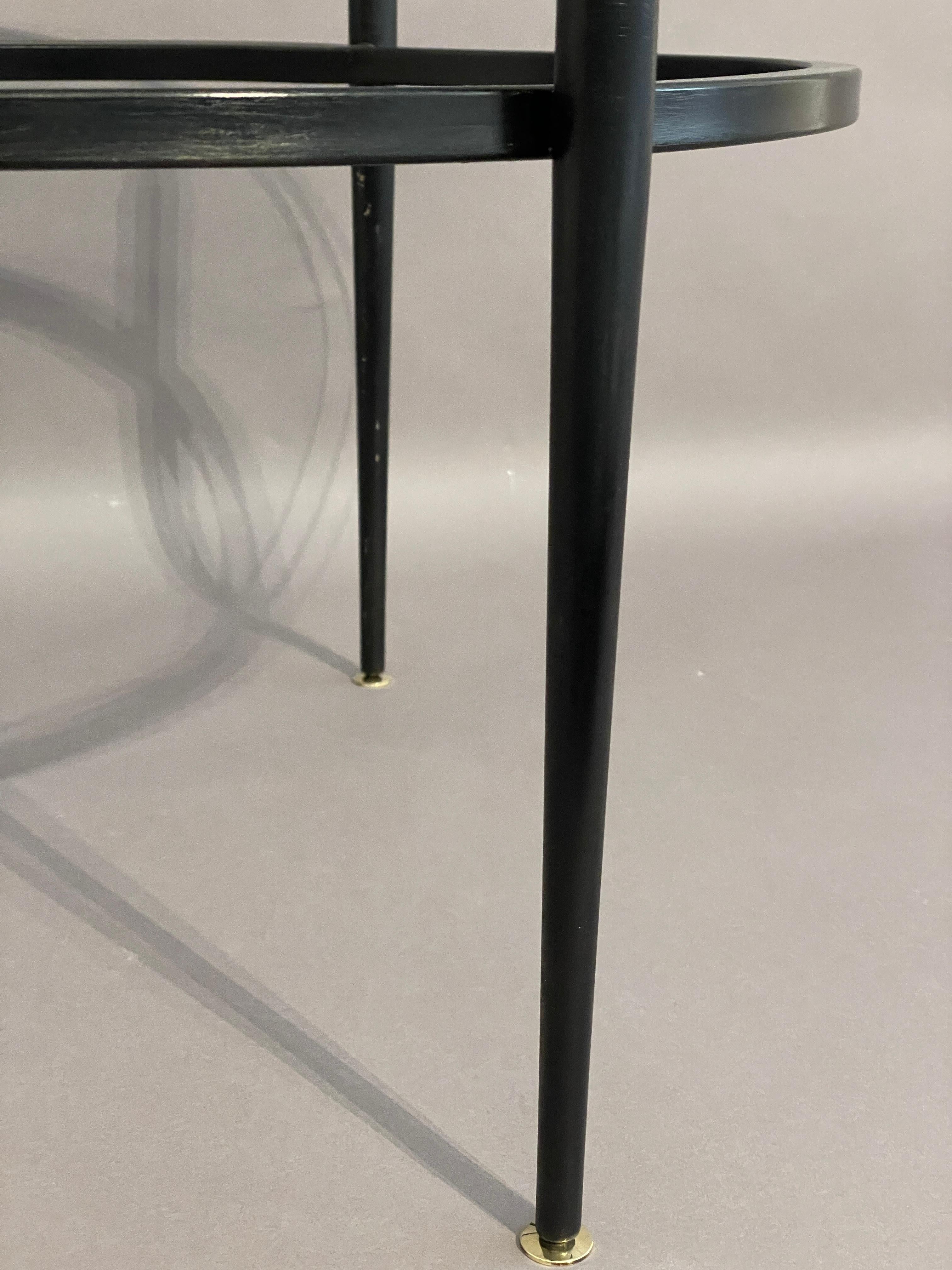Mid-20th Century A rare minimalist tubular Roger Le Bihan circular coffee table with brass feet