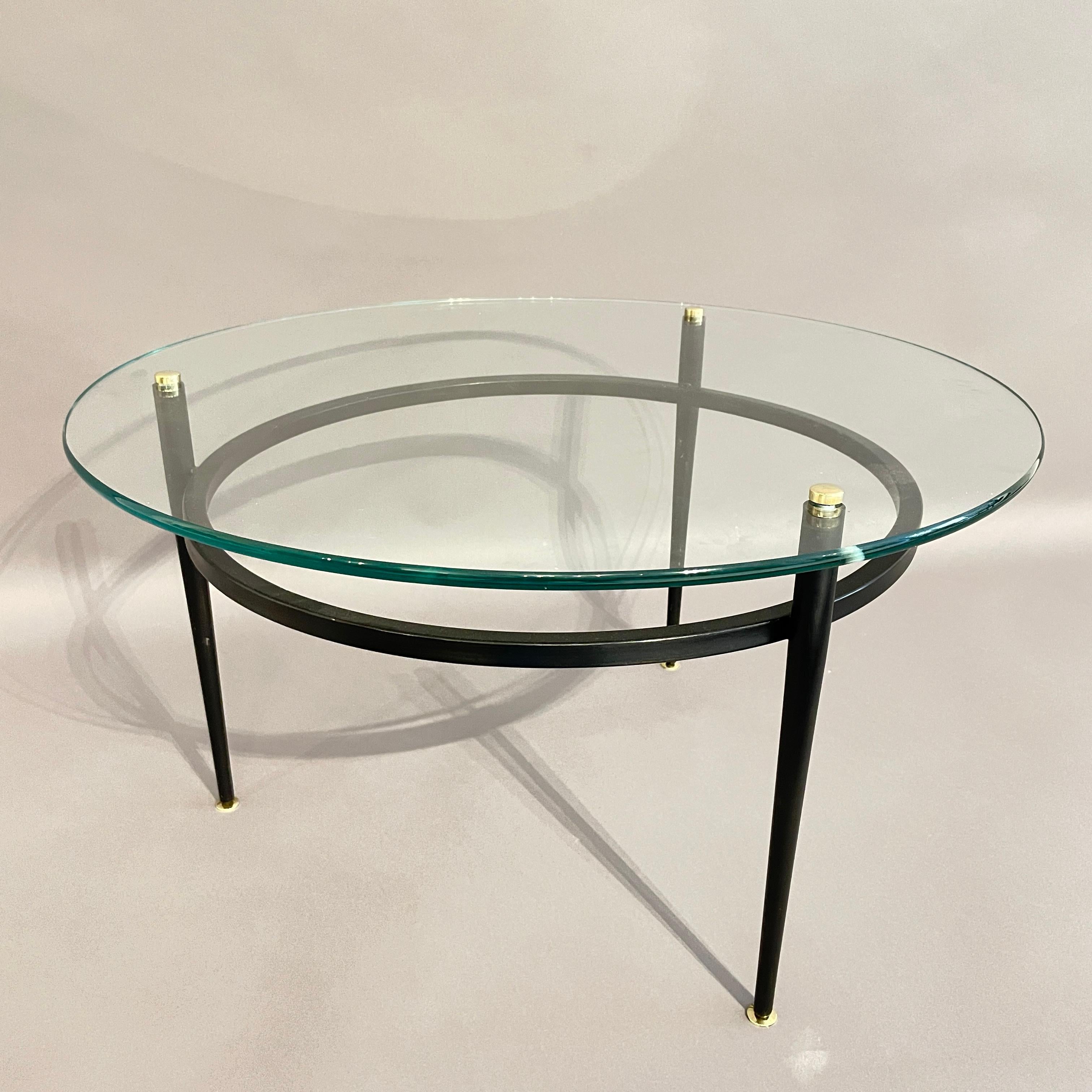 Steel A rare minimalist tubular Roger Le Bihan circular coffee table with brass feet