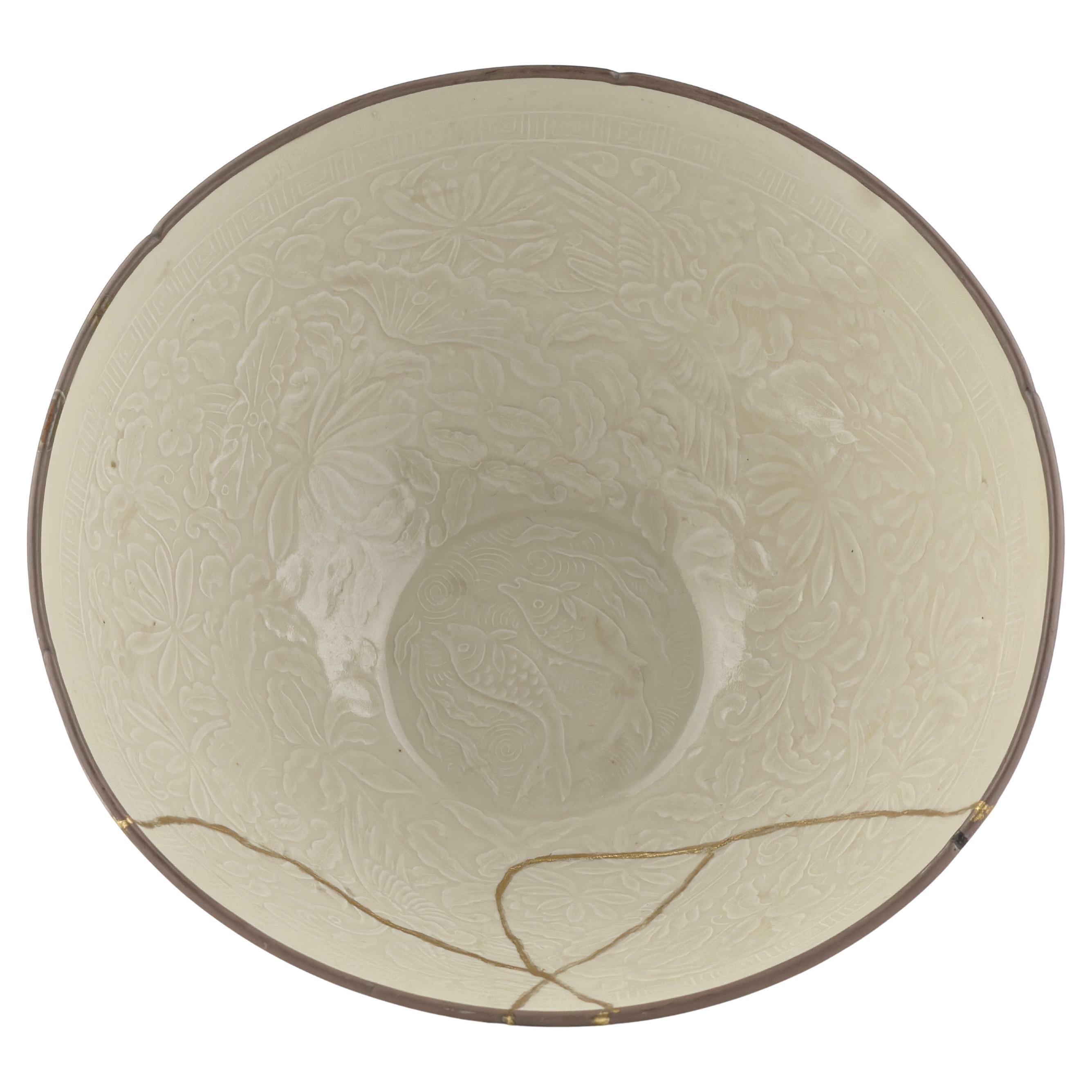 A Rare Moulded Dingyao 'Cranes And Fishes' Bowl, Northern Song - Jin Dynasty