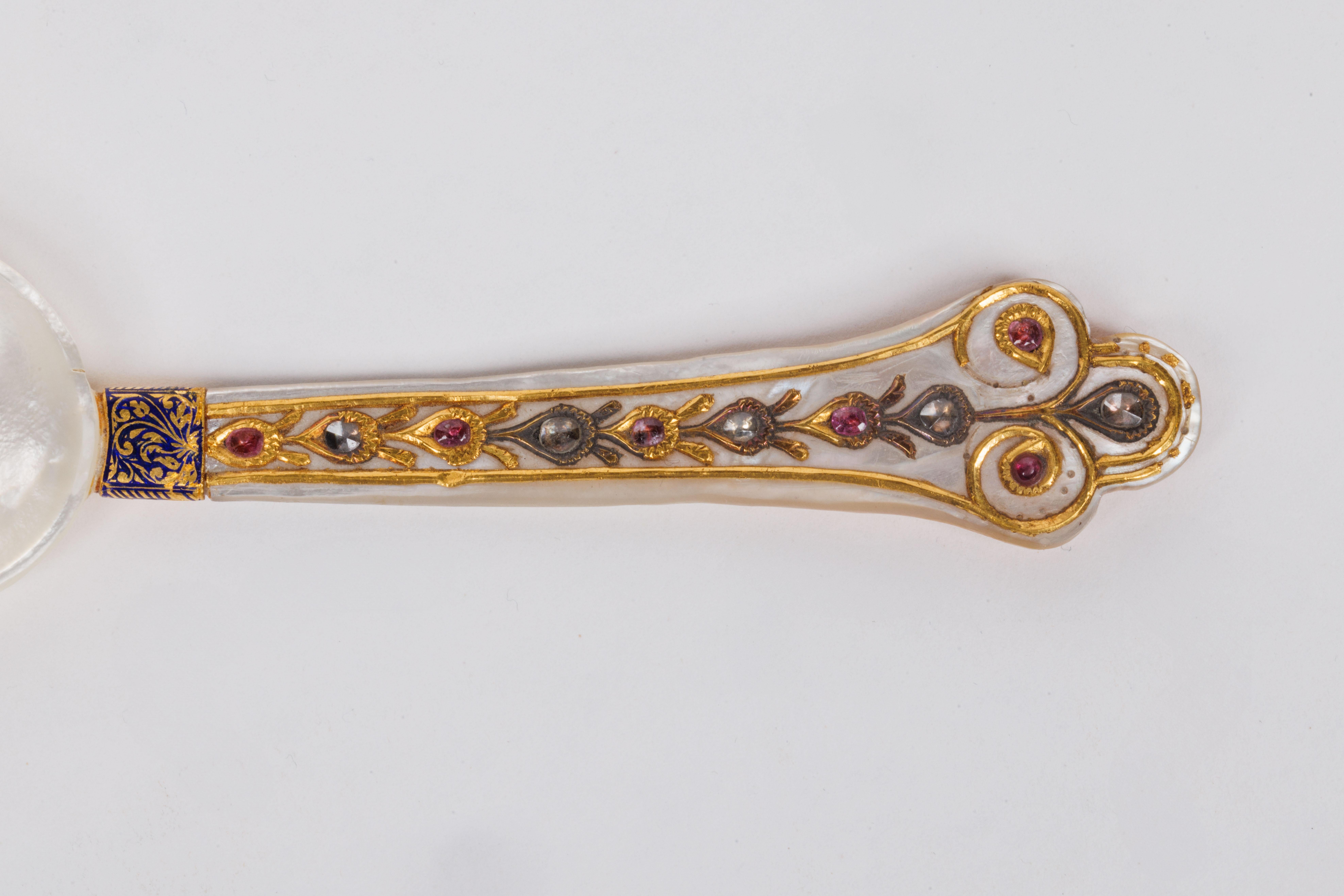 A Rare Mughal Indian Gold and Enamel Mother of Pearl Spoon with Diamonds

Discover the exquisite craftsmanship of Mughal India with this rare and luxurious gold and enamel spoon, a true collector's gem in the world of Indian art and objects. This