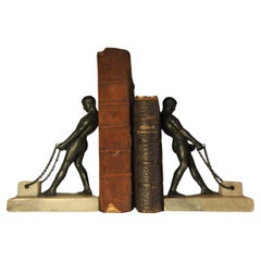 Rara coppia di reggilibri in bronzo del Grand Tour italiano del XIX secolo con figurine maschili