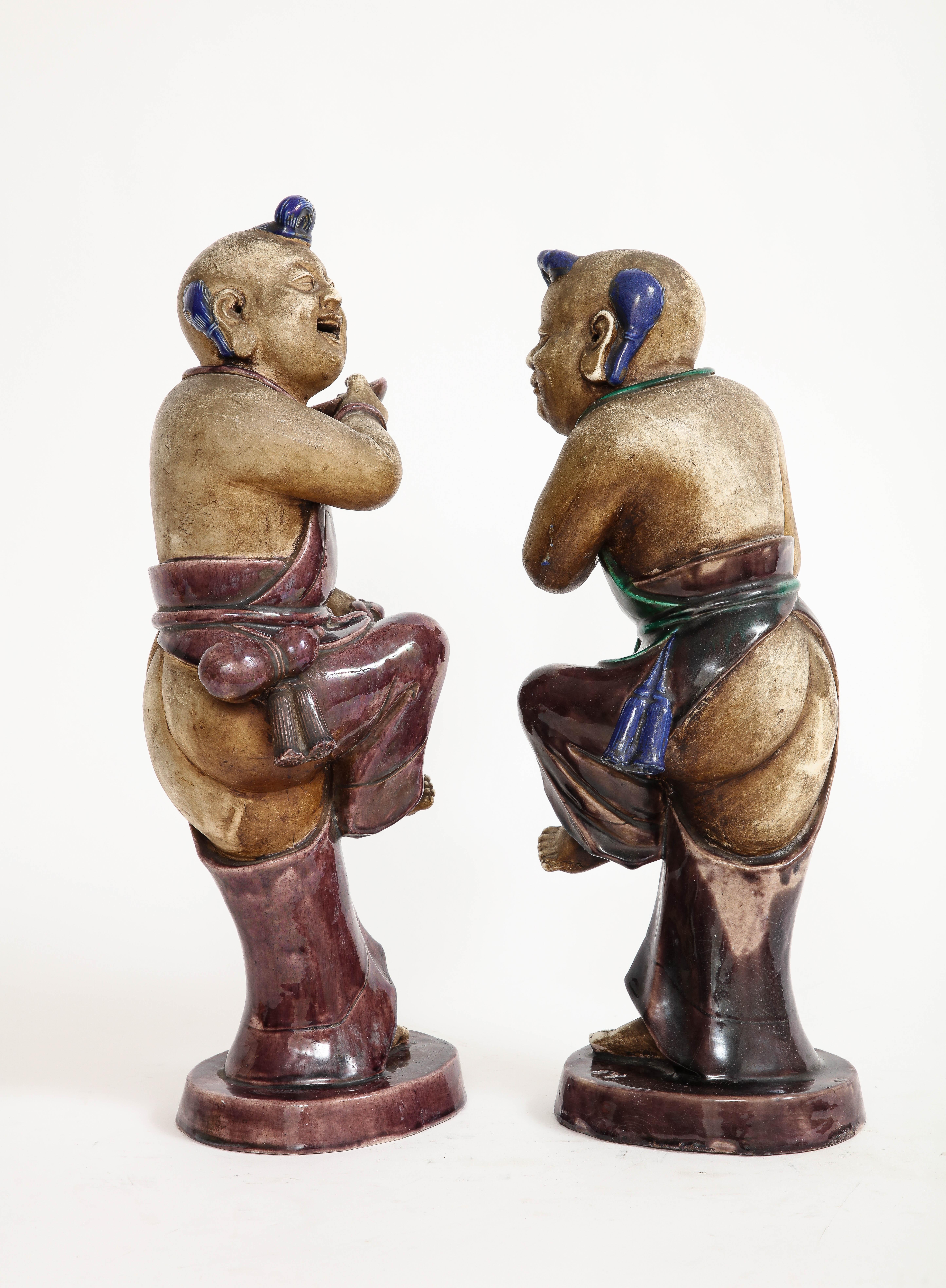 Early 18th Century A Rare Pair Chinese Kangxi Biscuit Porcelain Figures of Boy w/ Enamel Decoration For Sale