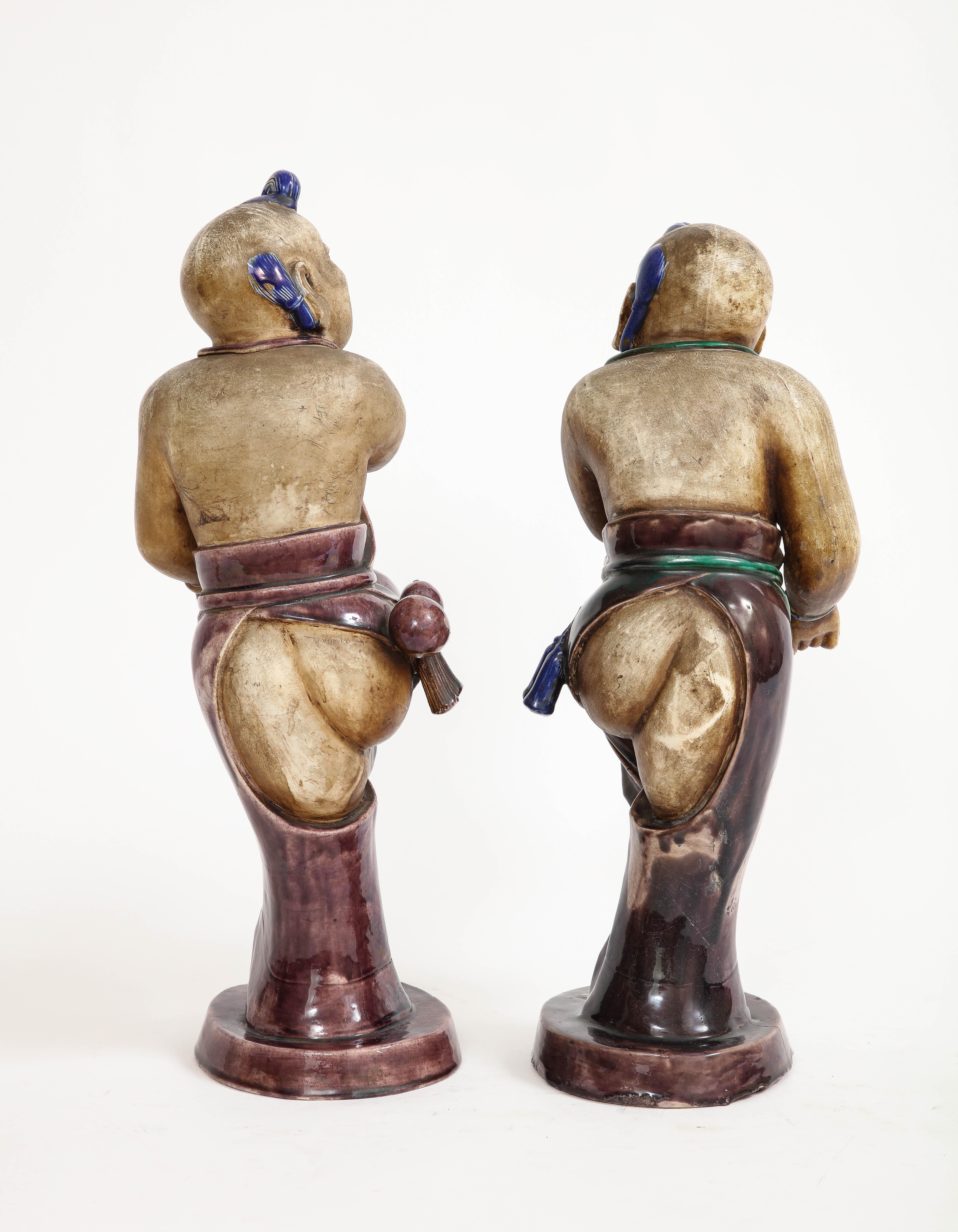 A Rare Pair Chinese Kangxi Biscuit Porcelain Figures of Boy w/ Enamel Decoration For Sale 1