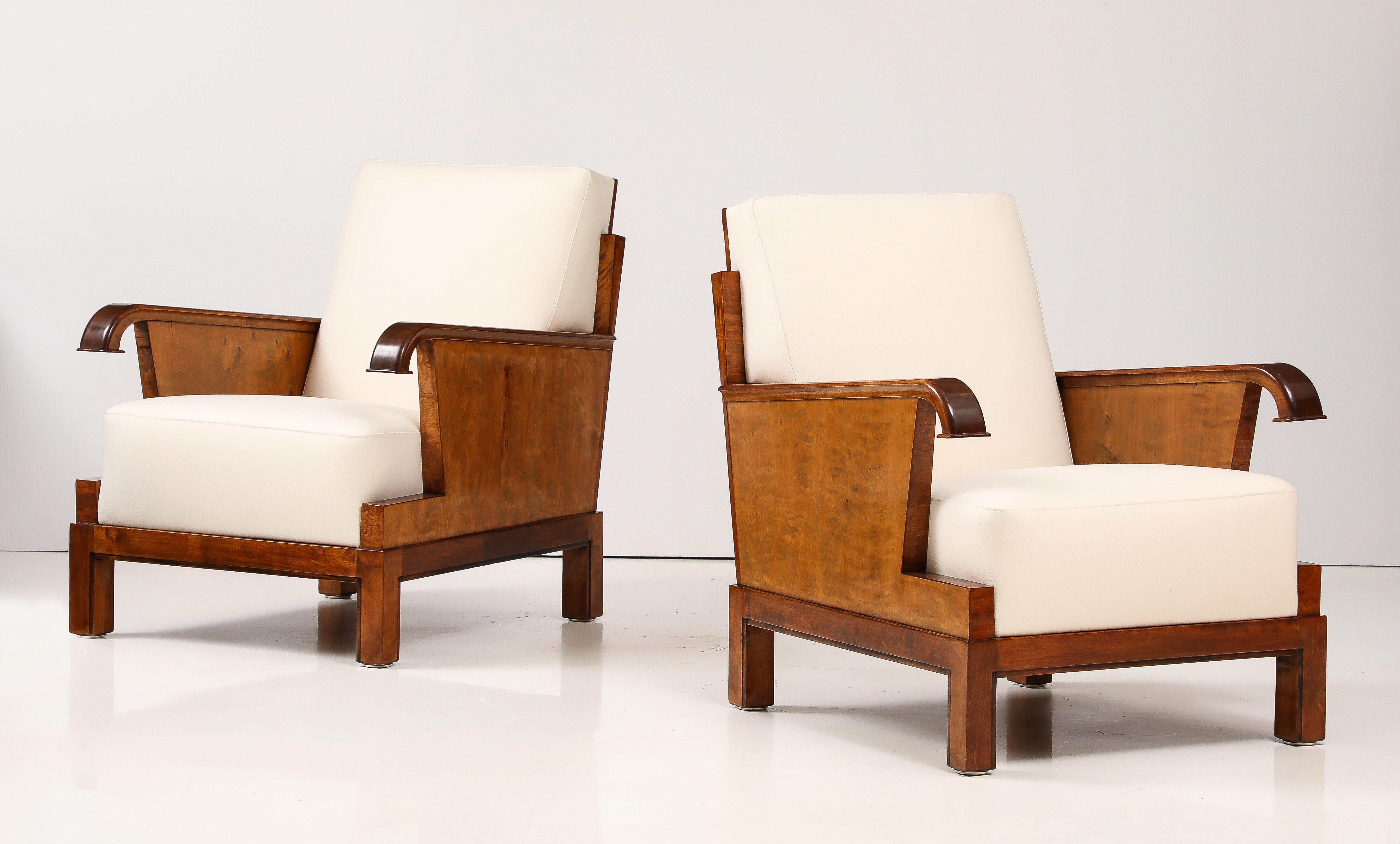 A rare pair of Finnish Modernist armchairs, Circa 1930s, produced by HMN (Mikko Nupponen) and probably designed by Olavi Hänninen. with full scale birch frames and drop in upholstered seats and back.