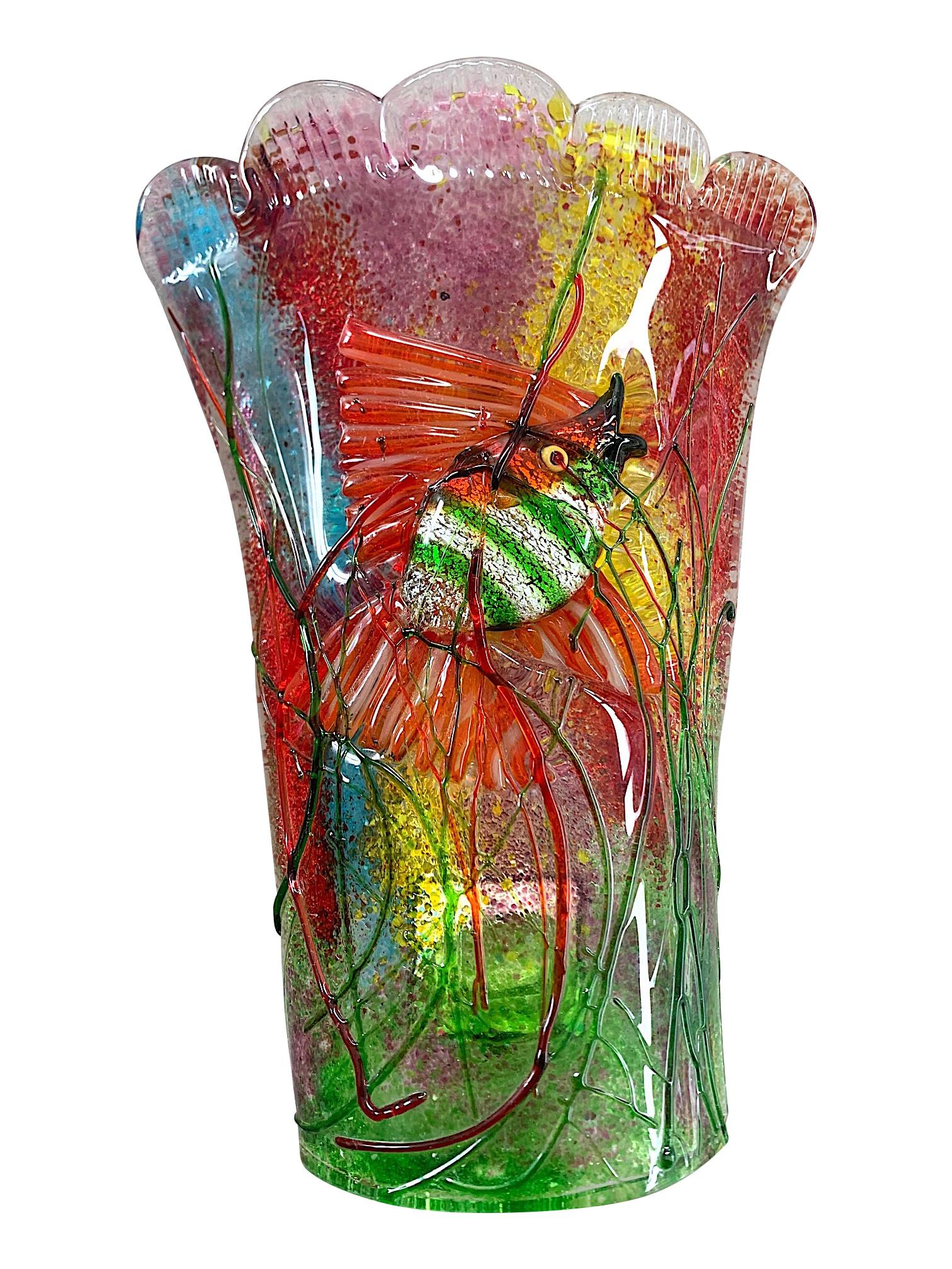A lovely pair of 1950s Murano glass wall sconces by Alfredo Barbini for glass company Cenedese each with exquisite multicolored detail, with a green and silver striped fish in an underwater aquarium setting. Each has a single brass fitting and brass