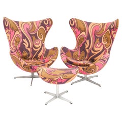 A rare pair of Arne Jacobsen for Fritz Hansen Egg chairs with ottoman, C 1973.