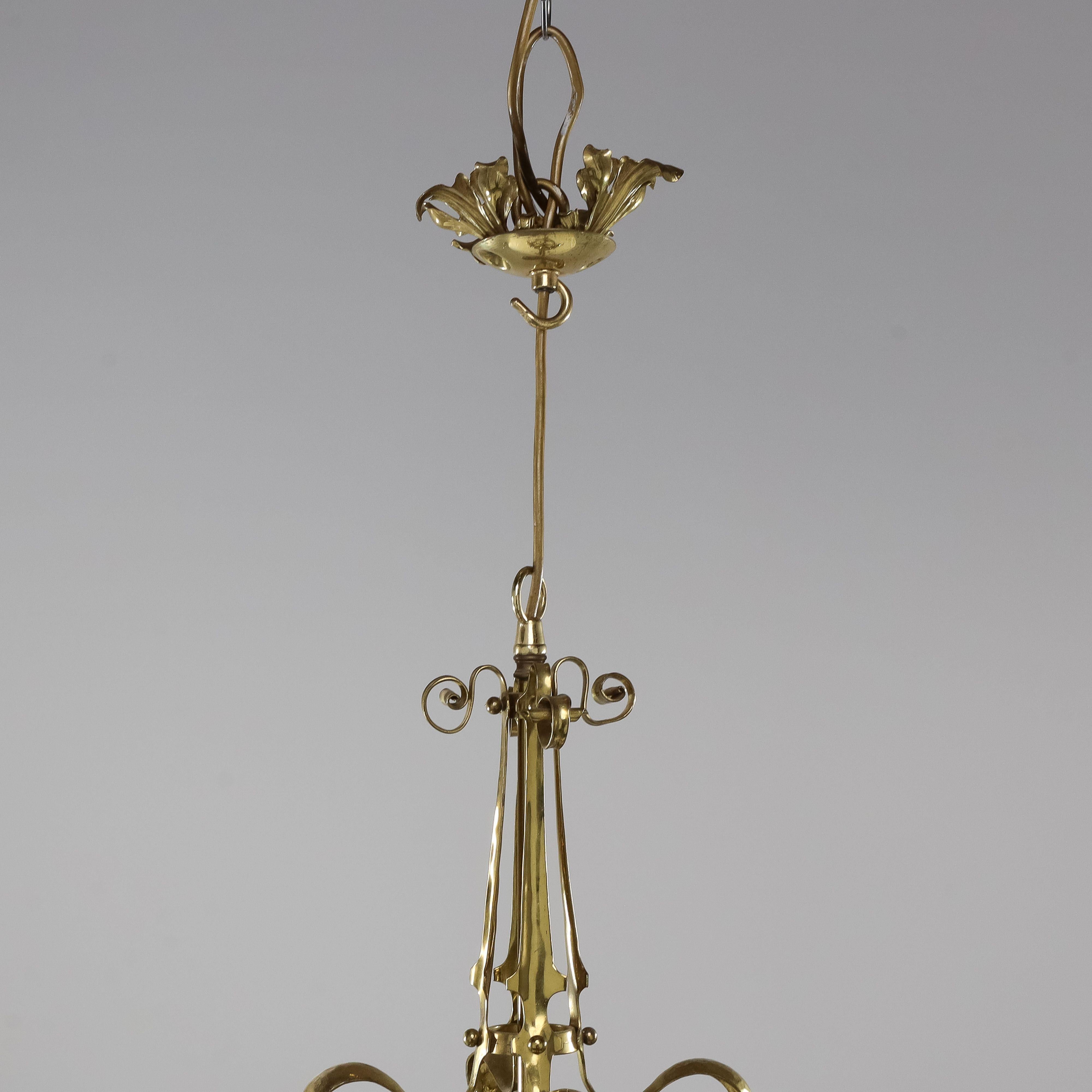 Early 20th Century A rare pair of Arts and Crafts hand-hammered ceiling lamps For Sale
