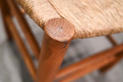 A Rare Pair of “Bauche” Rush Stools, Attributed to Charlotte Perriand