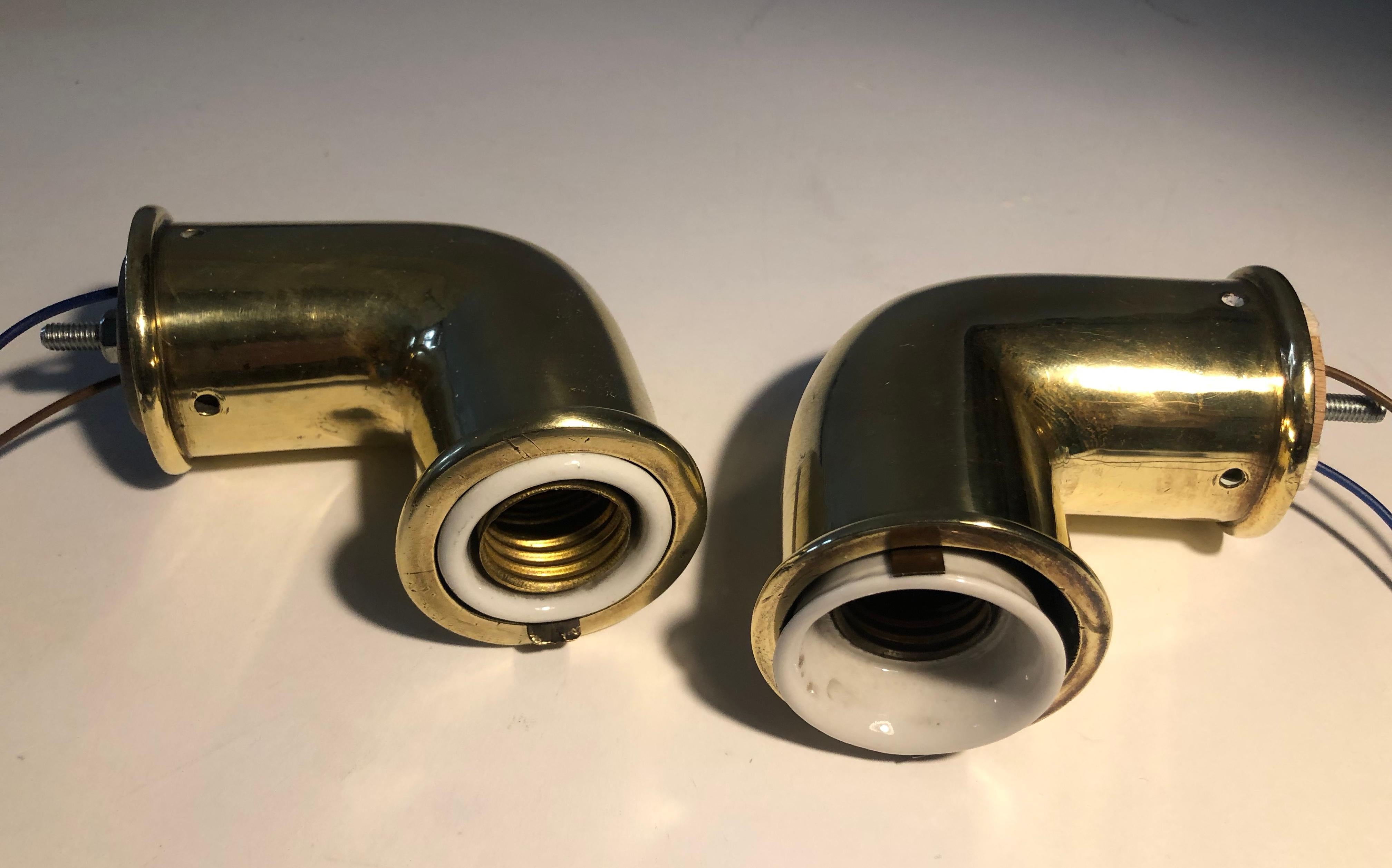 This is a unique pair of wall scones from the 1930's, designed and made in Austria.
What makes them special is that they are not the same size and use two different fixtures. The
light bulb type remains the same for both lamps. The dimensions are 9