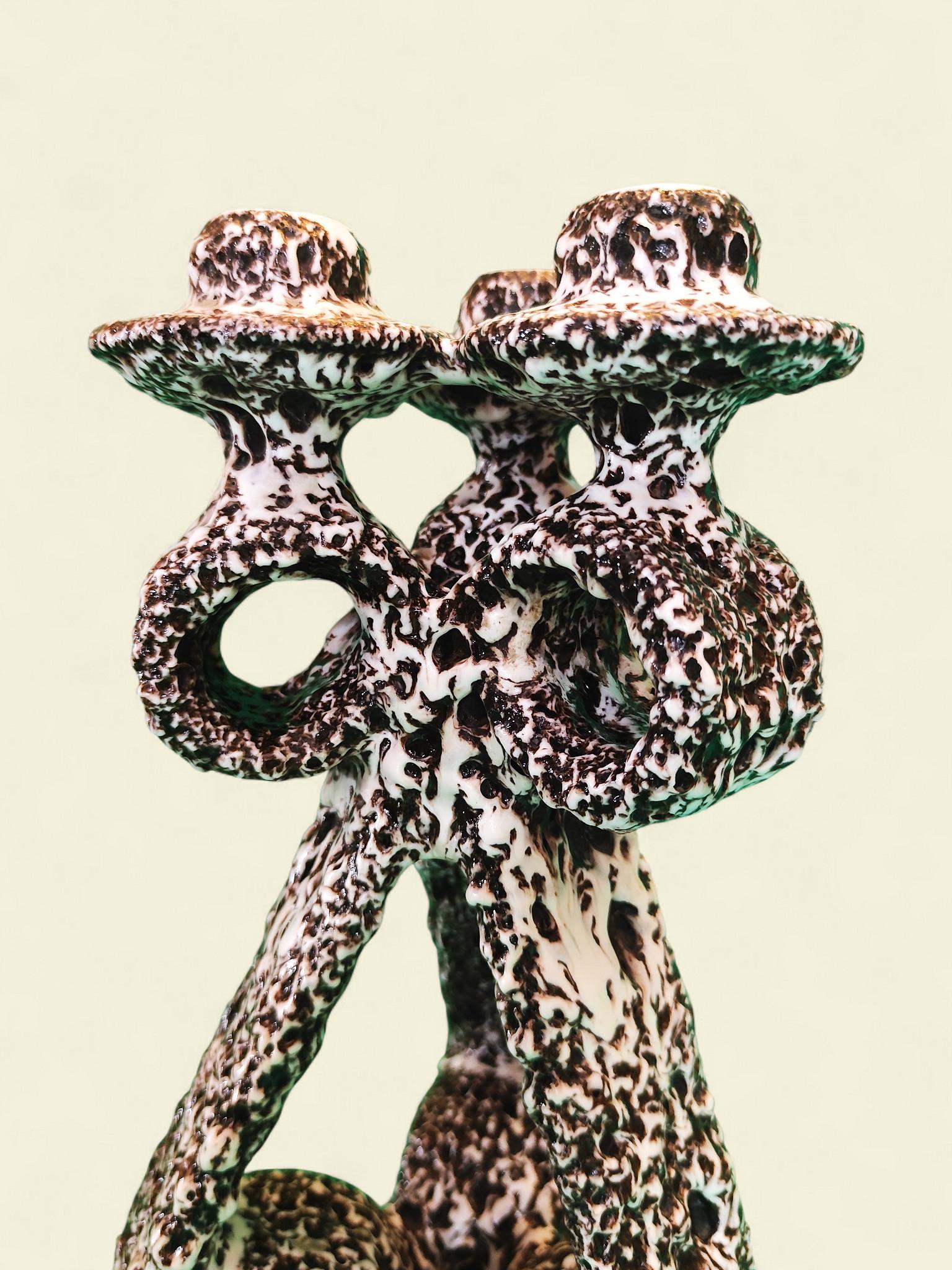 Una rara coppia di candelabri in 