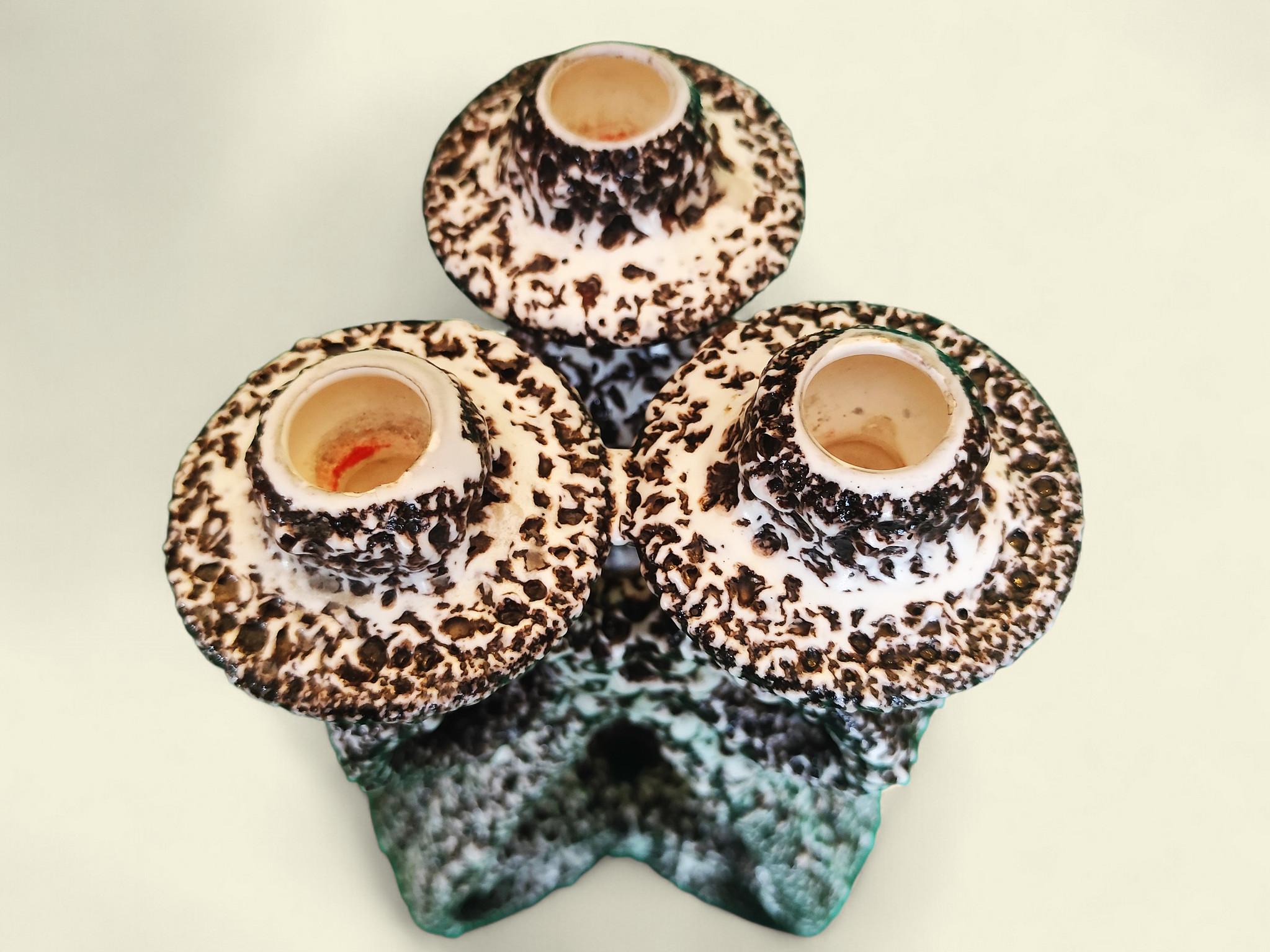 Una rara coppia di candelabri in 