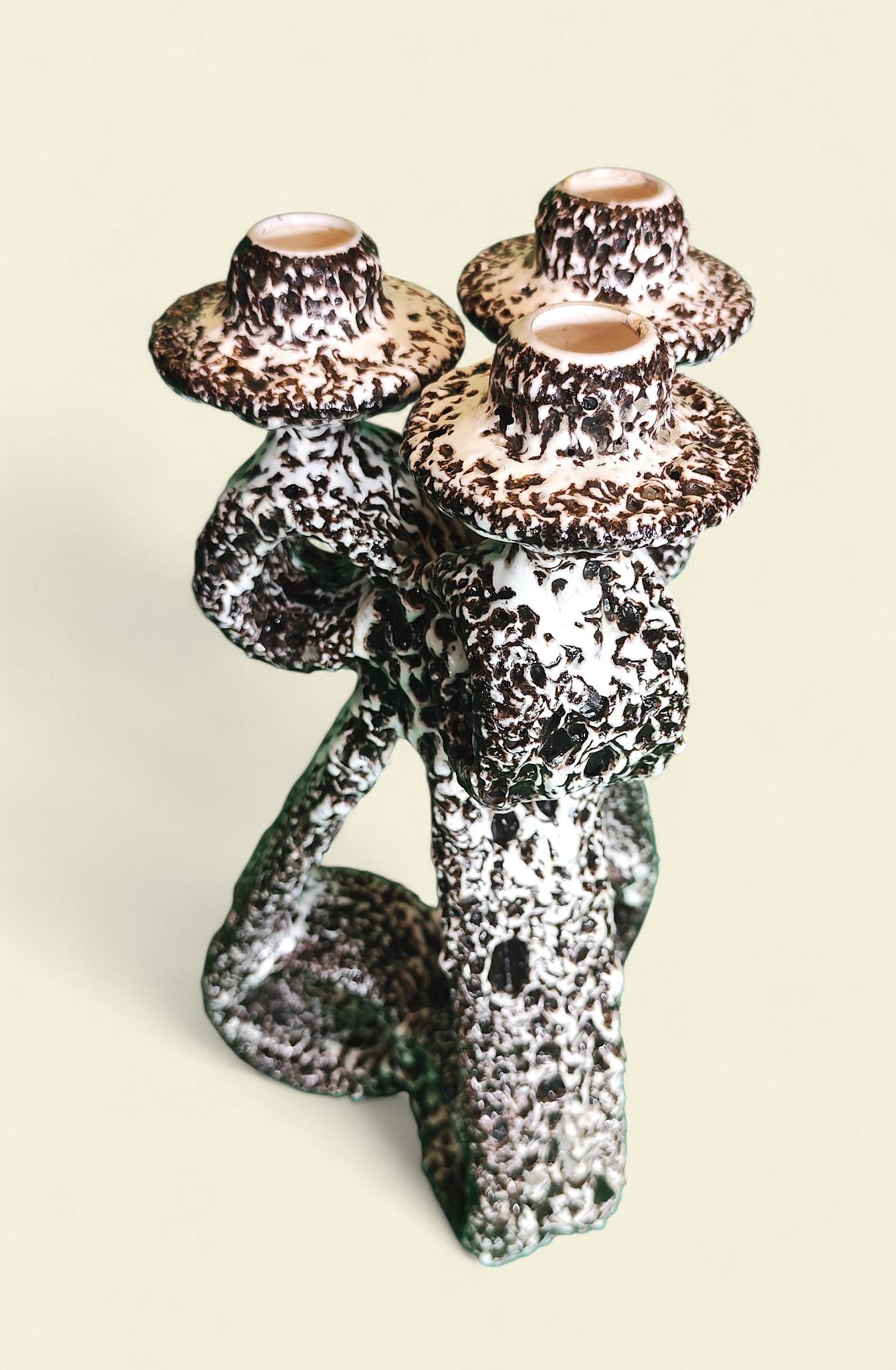 Una rara coppia di candelabri in 