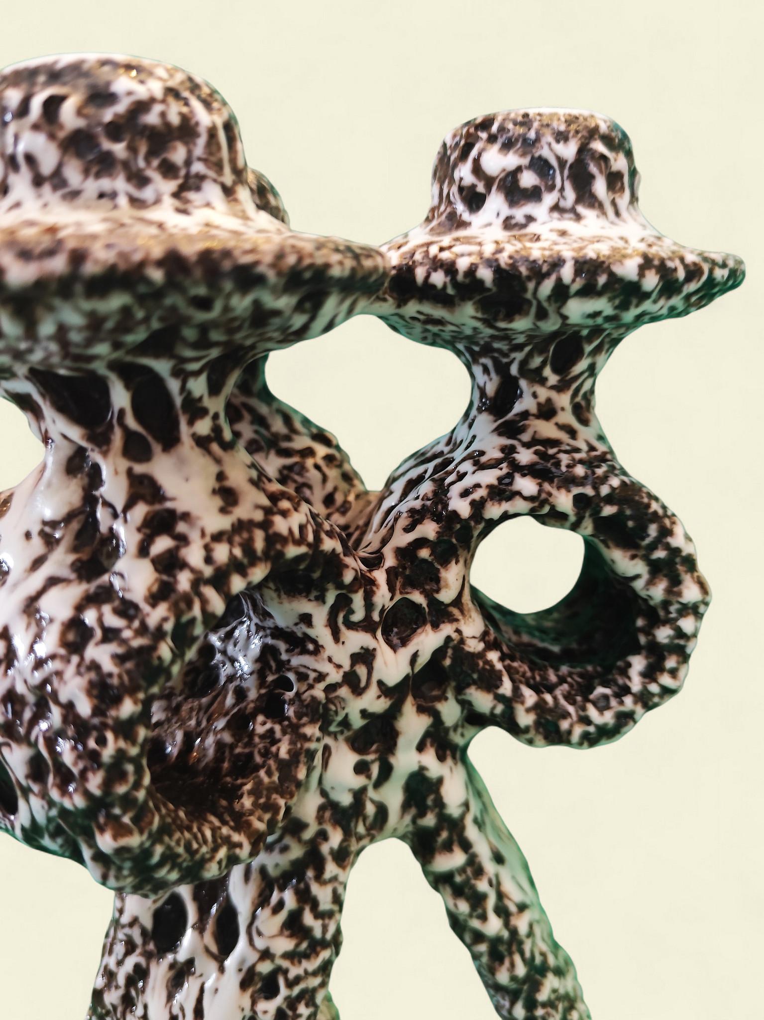 Una rara coppia di candelabri in 